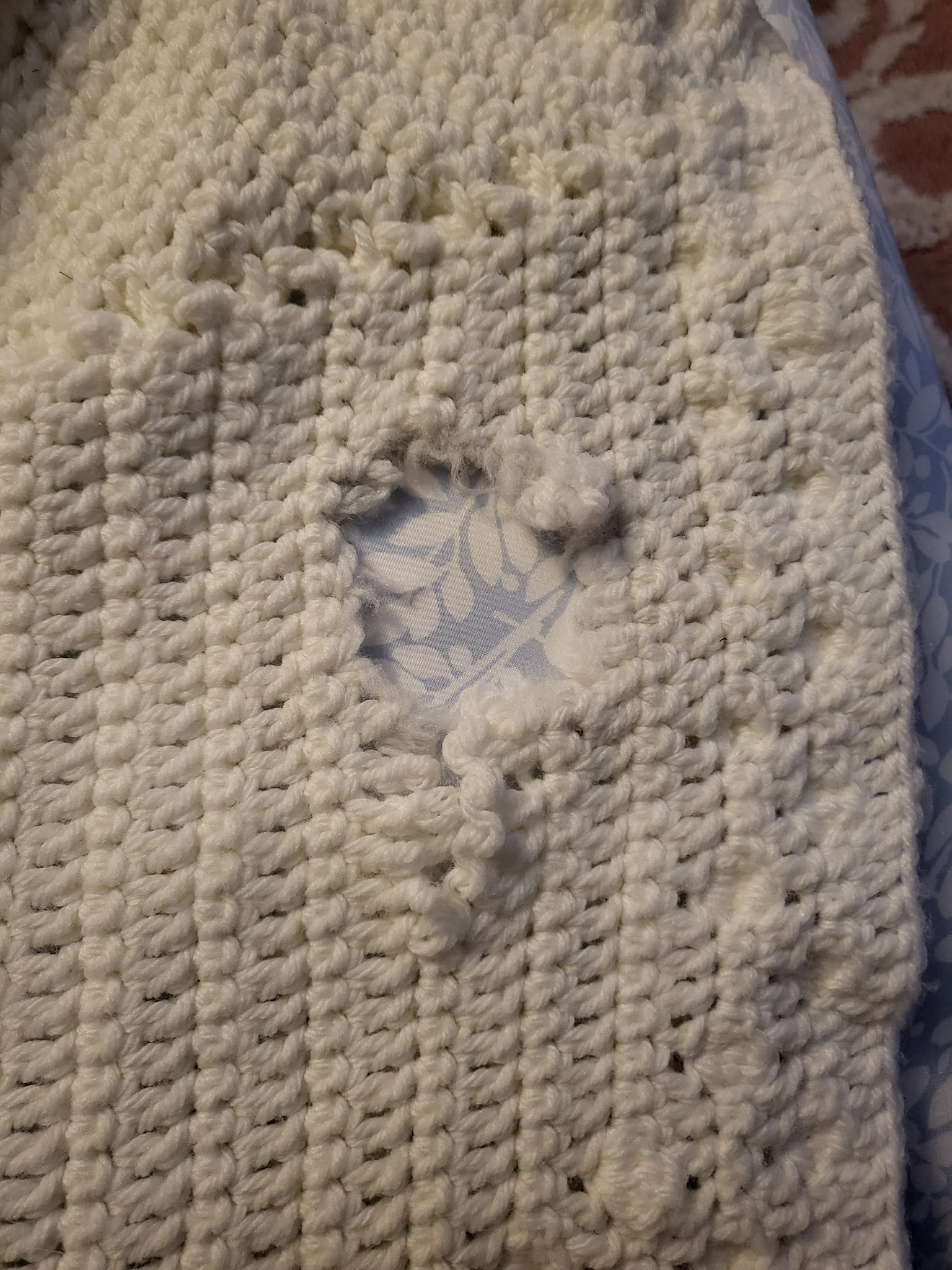 Repairing mouse damaged hand knit sweater?