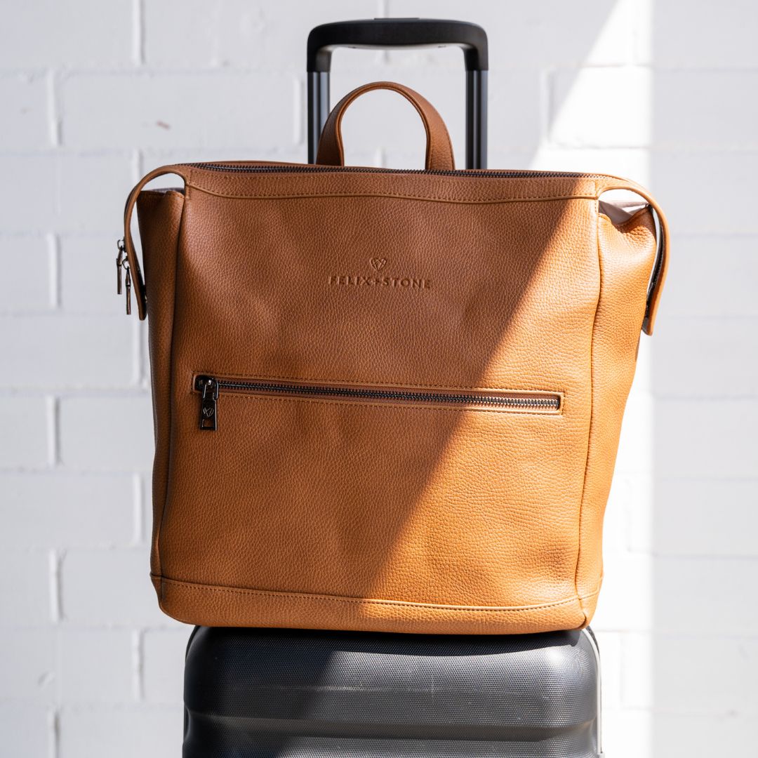 FELIX - Perfect for travel, our Archie backpack features a luggage slip ...