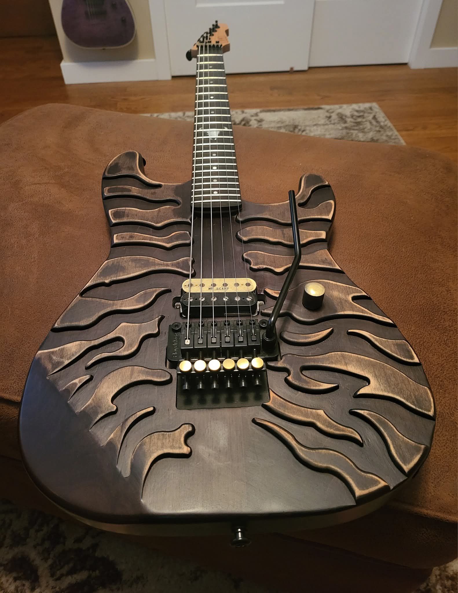 George Lynch signs LTD Burnt Tiger guitar