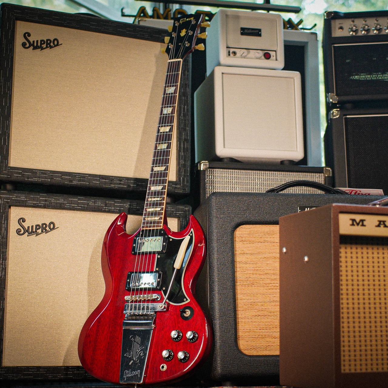 What is the origin and model of the Tomson SG guitar?