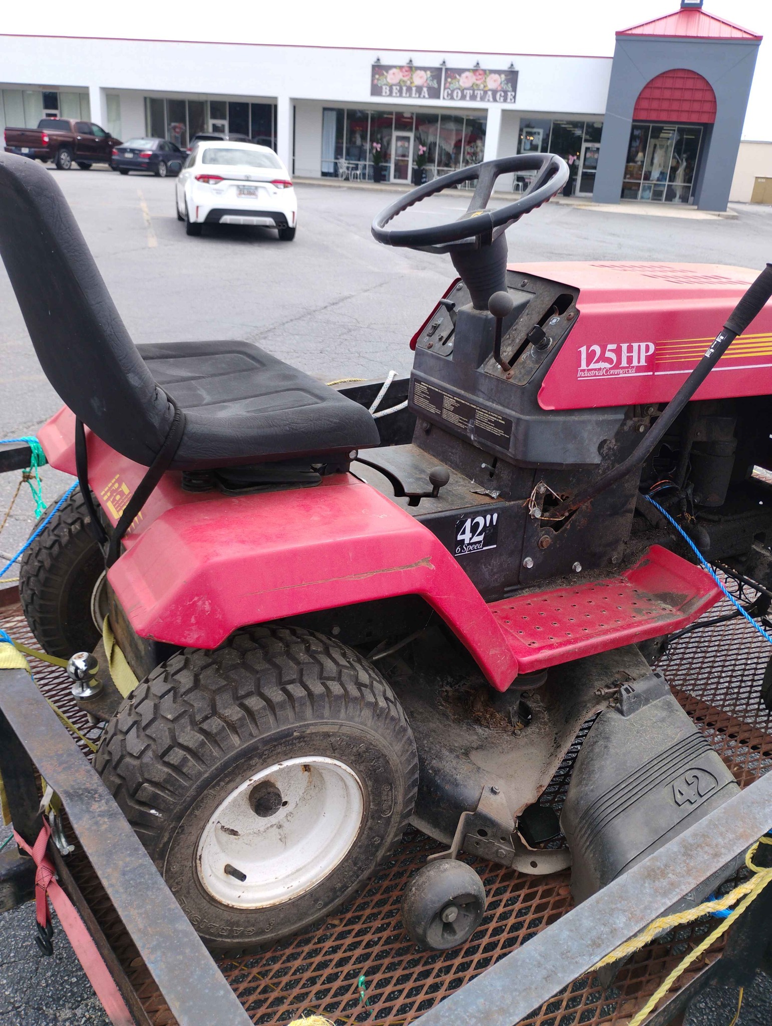 Riding lawnmower: For sale, not running.