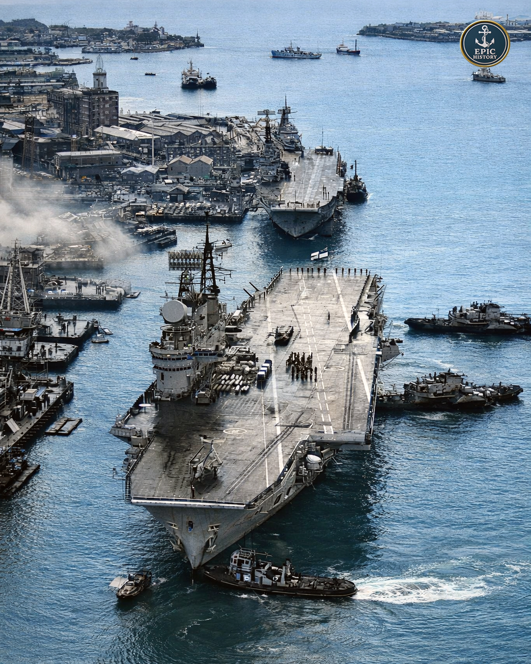 Epic - Tugboats maneuver the Royal Navy Audacious-class aircraft ...