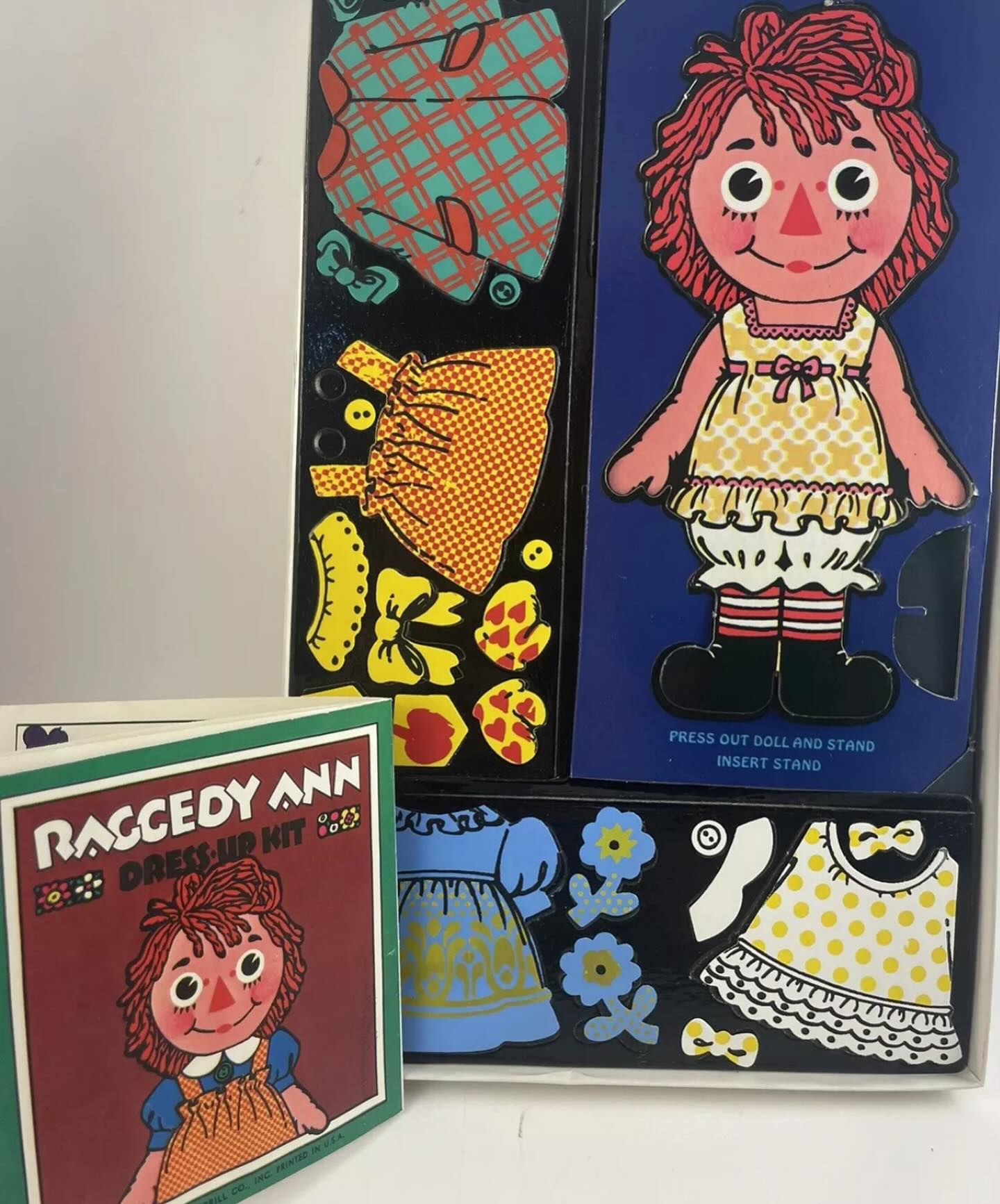 I had this Raggedy Ann Colorform set Dressed her up for years