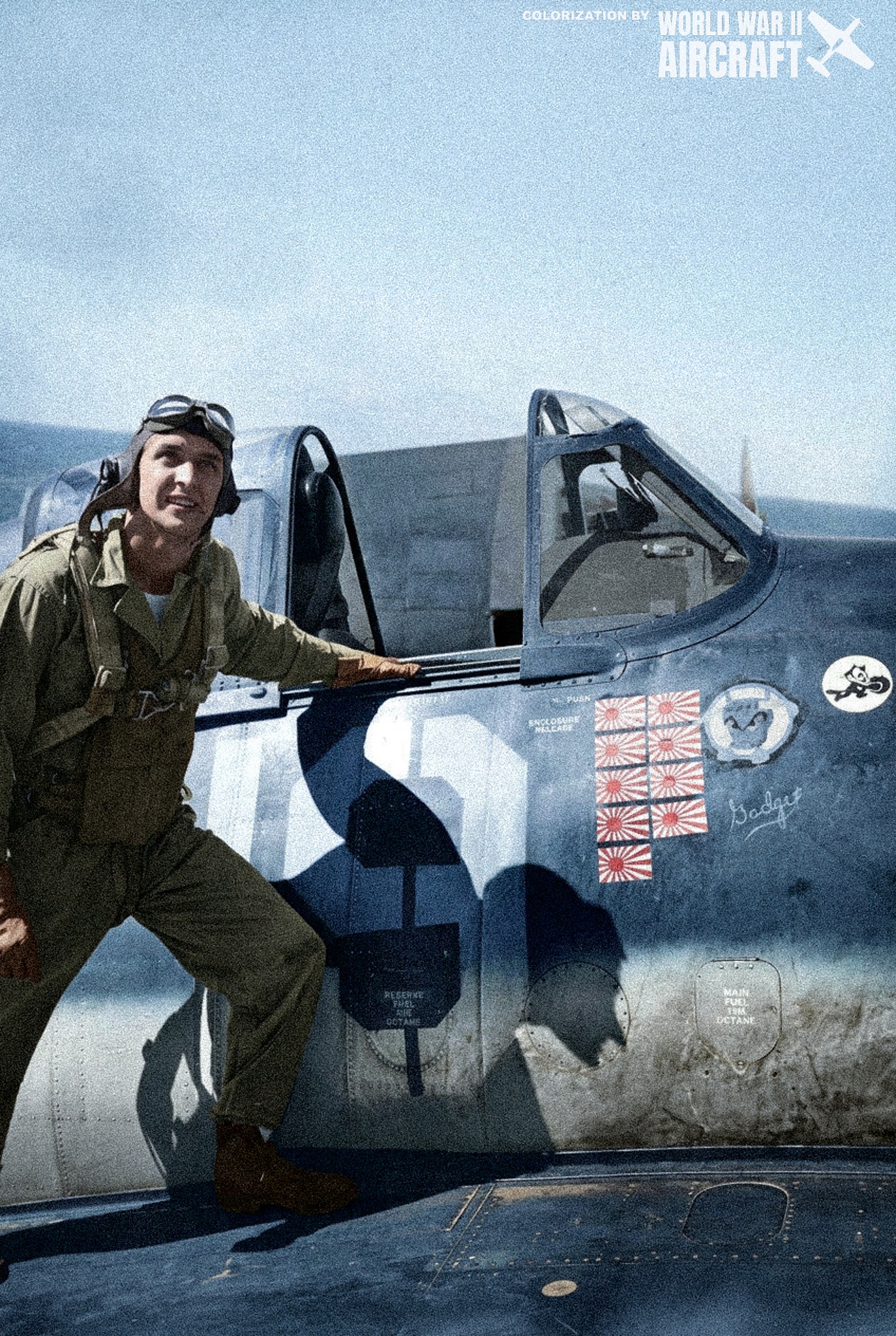 Lieutenant (jg) Alexander Vraciu climbs into his F6F Hellcat