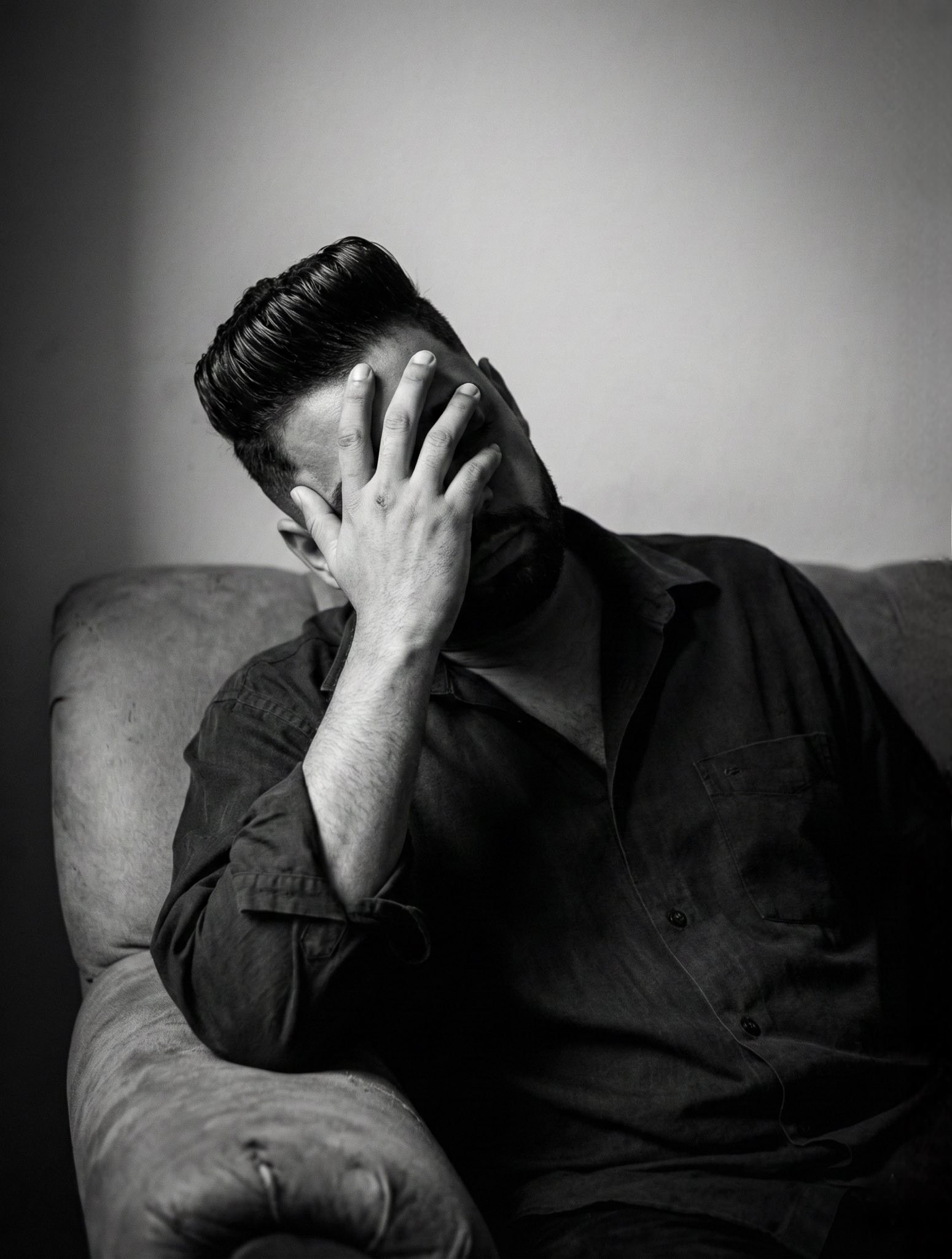 Khaled - Moody black-and-white cinematic portrait of a clean-shaven ...