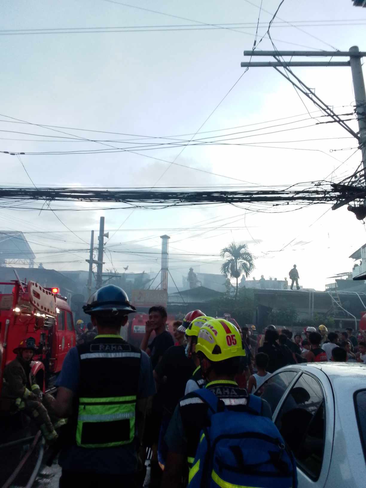Philippine - Firefighters respond to a second alarm fire that hit a ...