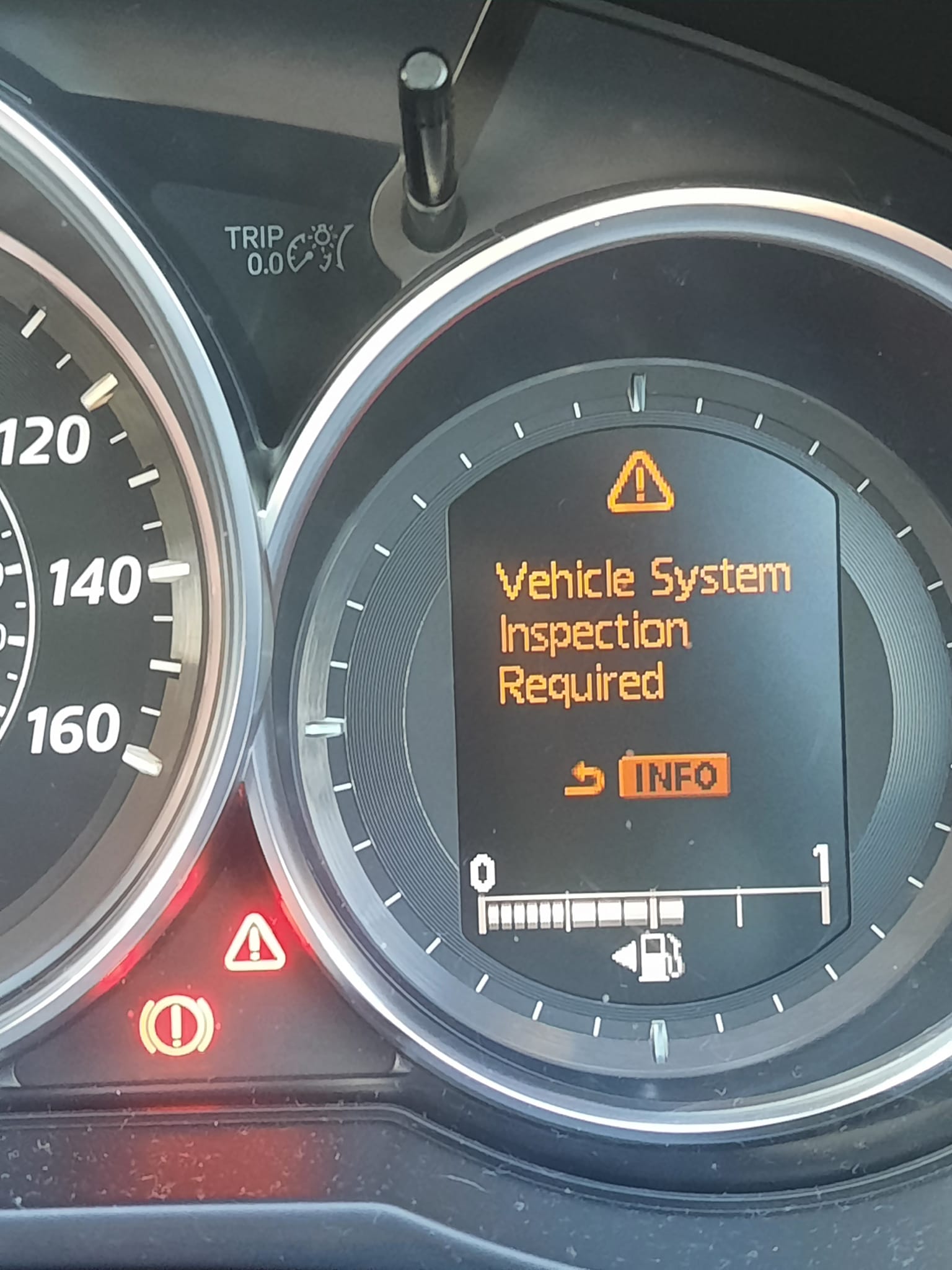 What does this warning light mean on my Mazda 6?