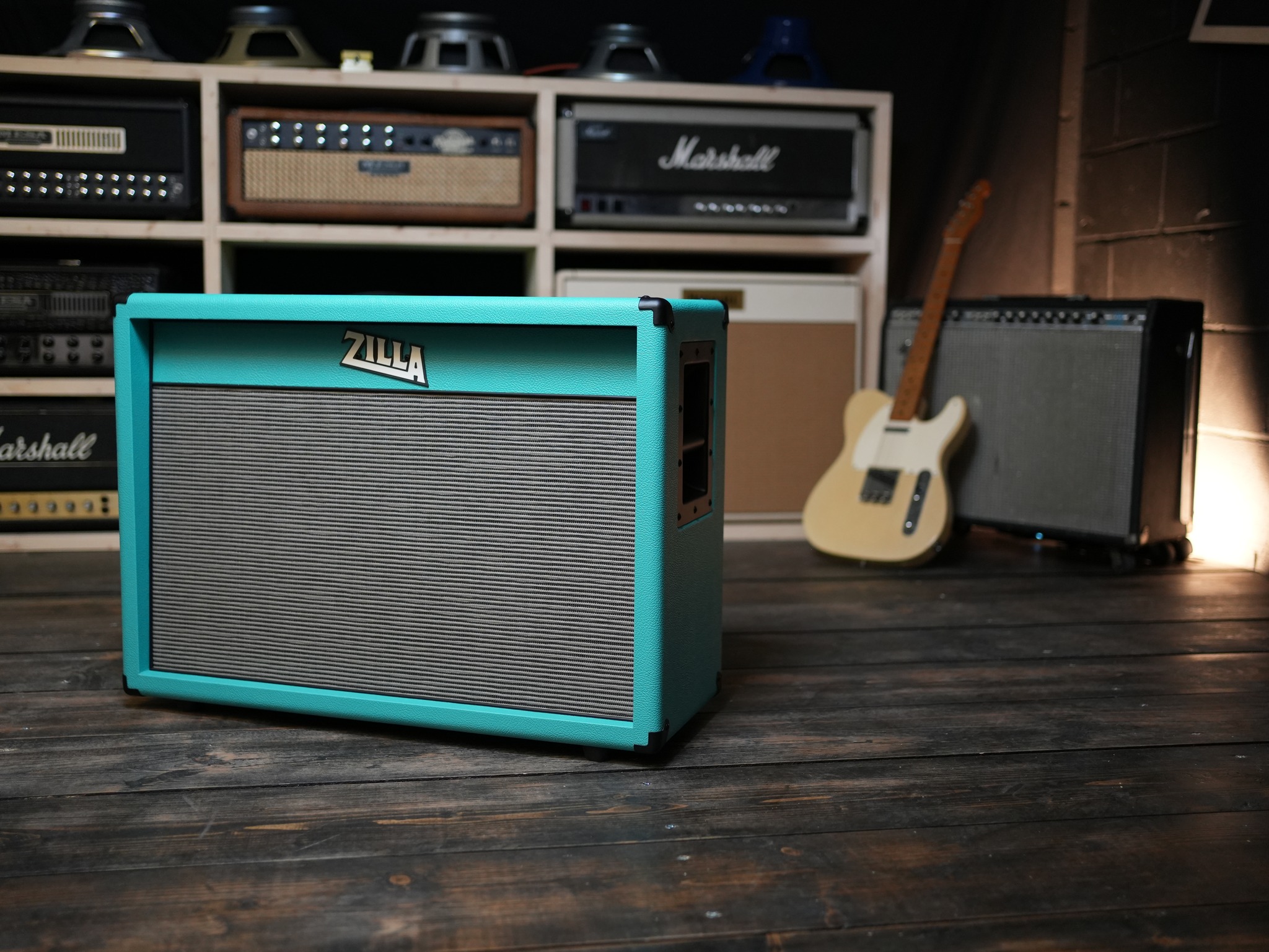 Black pipe and hardware really pops against the teal tolex.