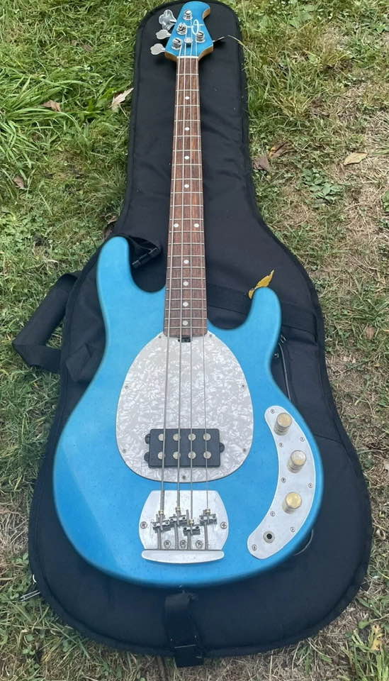 Overpriced OLP Bass Guitar with Unconventional Bridge Setup