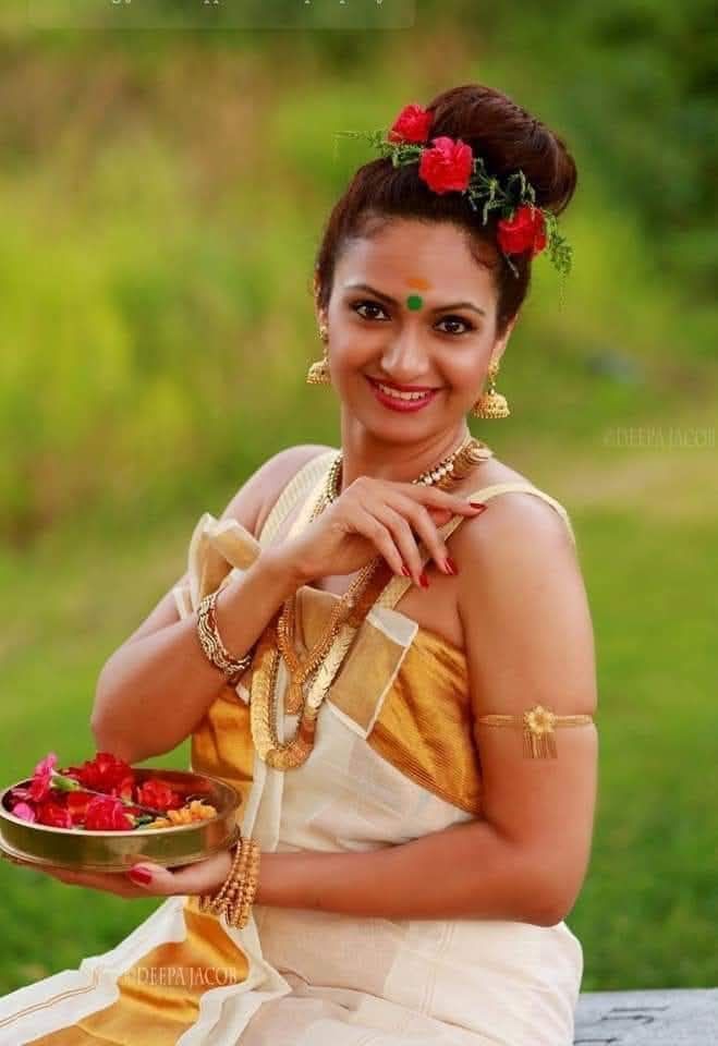 kerala lady dress A beautiful / model in traditional attire of kerala, India, is God's own country Peridot