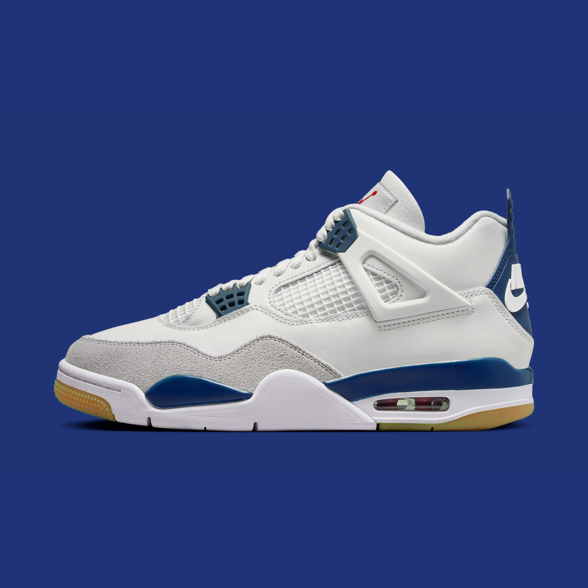 Detailed look at the Nike SB x Air Jordan 4 “White/Navy” set for 