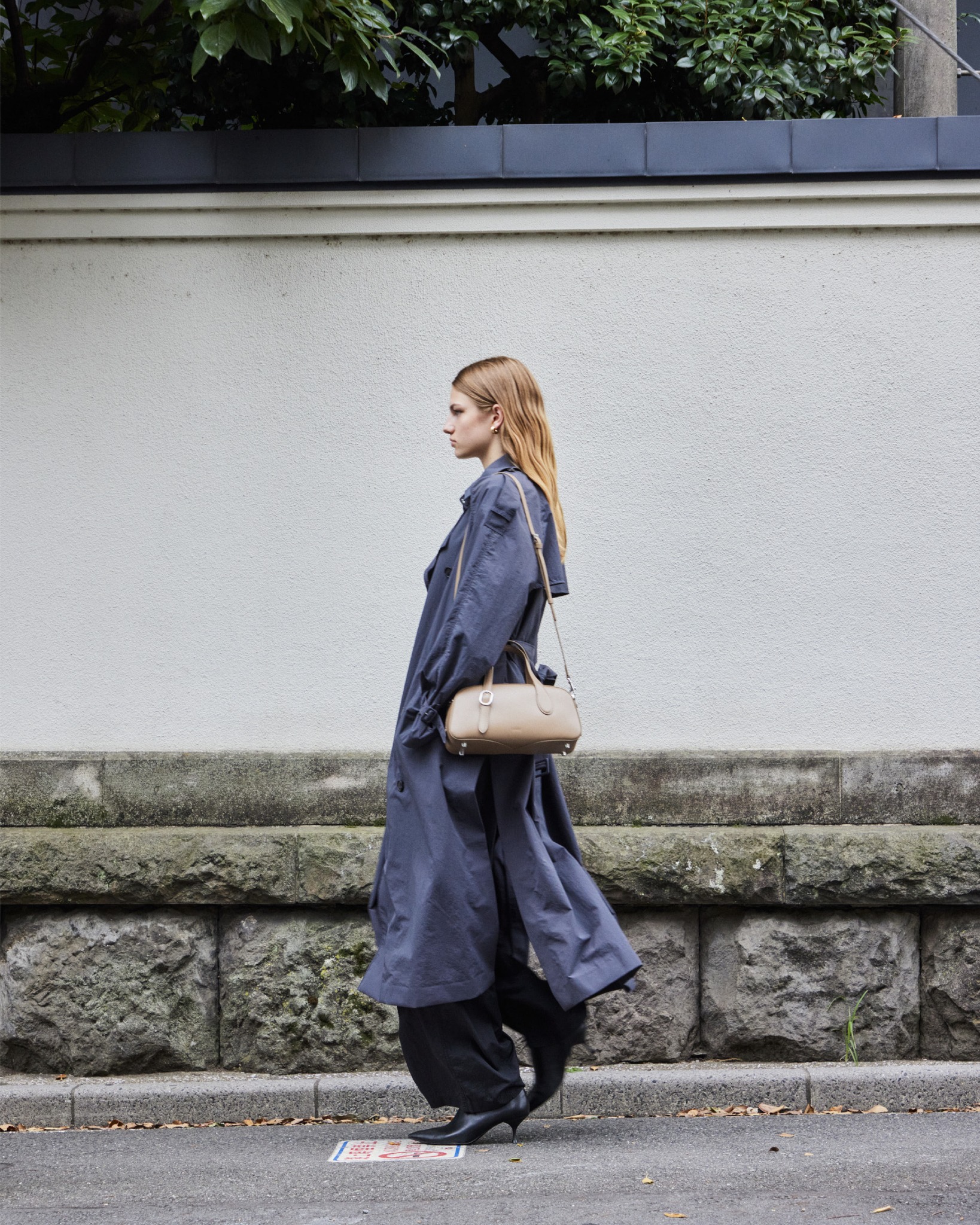The Small Asra Boston Bag, crafted from only two pieces of Italian 