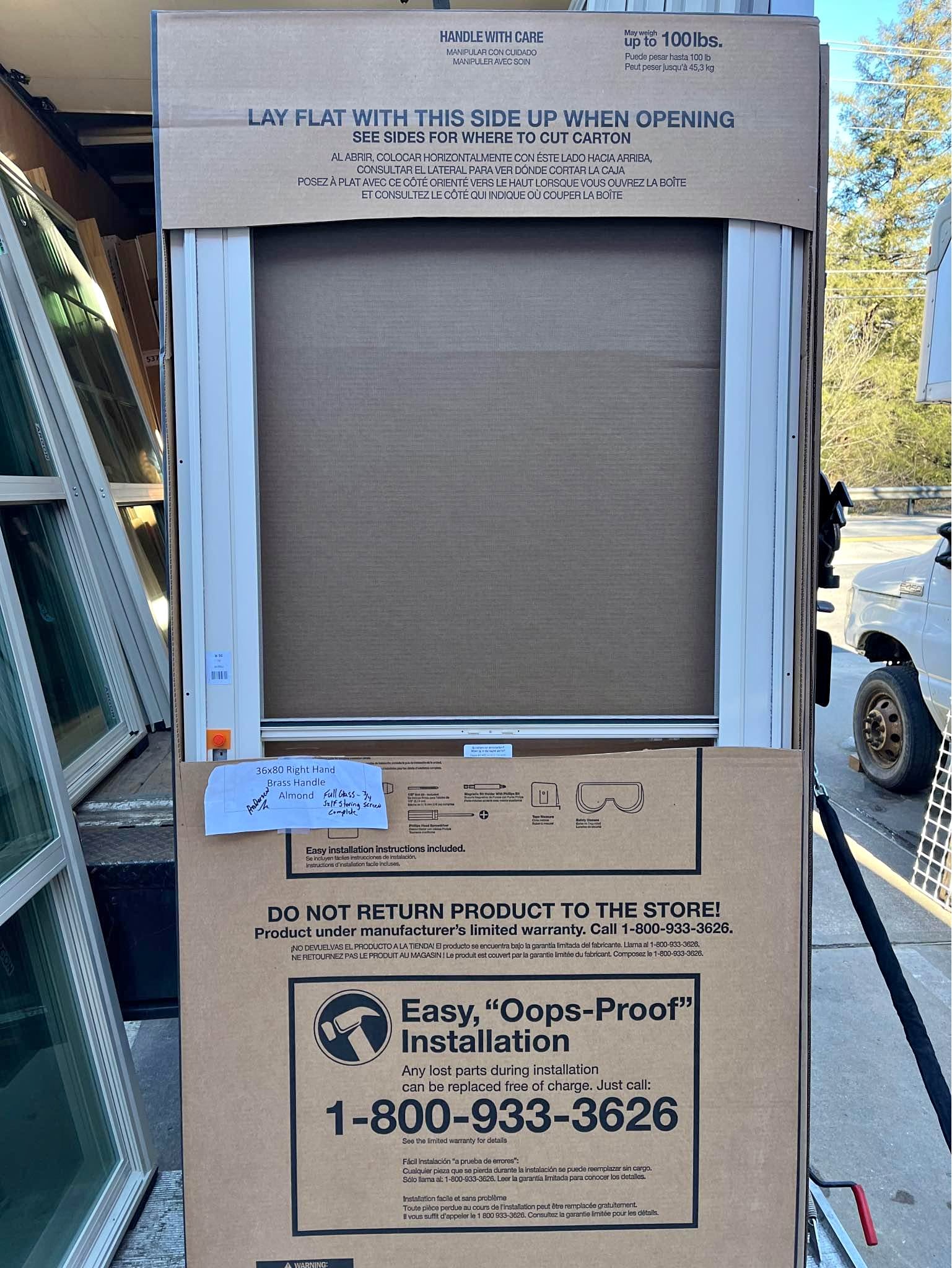 36x80 new Andersen screen / storm doors self storing almond right hand