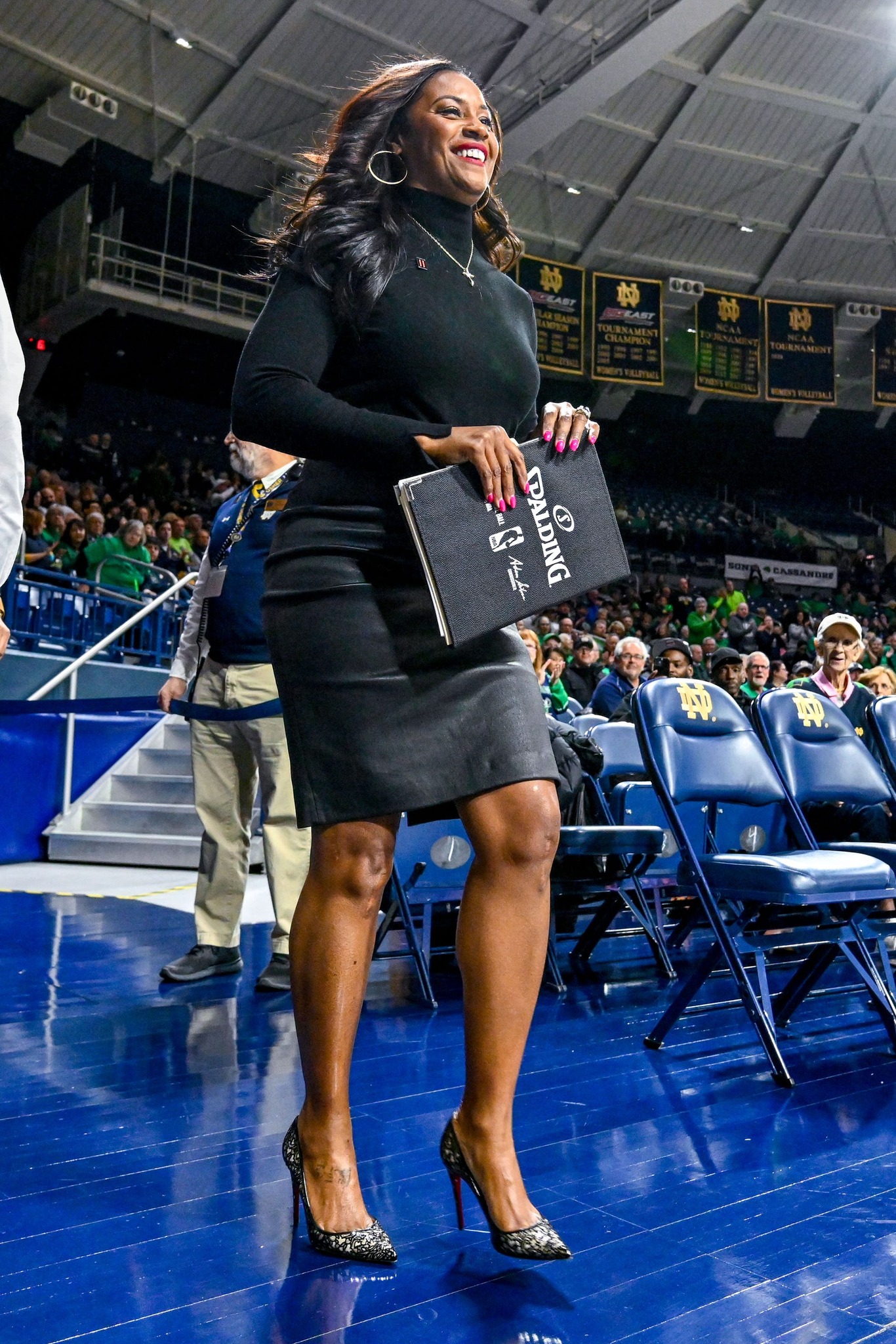 niele ivey green dress is a force! Making a statement every time her team hits the hardwood 🏀 Notre Dame is set to play Fairfield tomorrow and our question is: what's she wearing next? 🔥 variant available: US 2