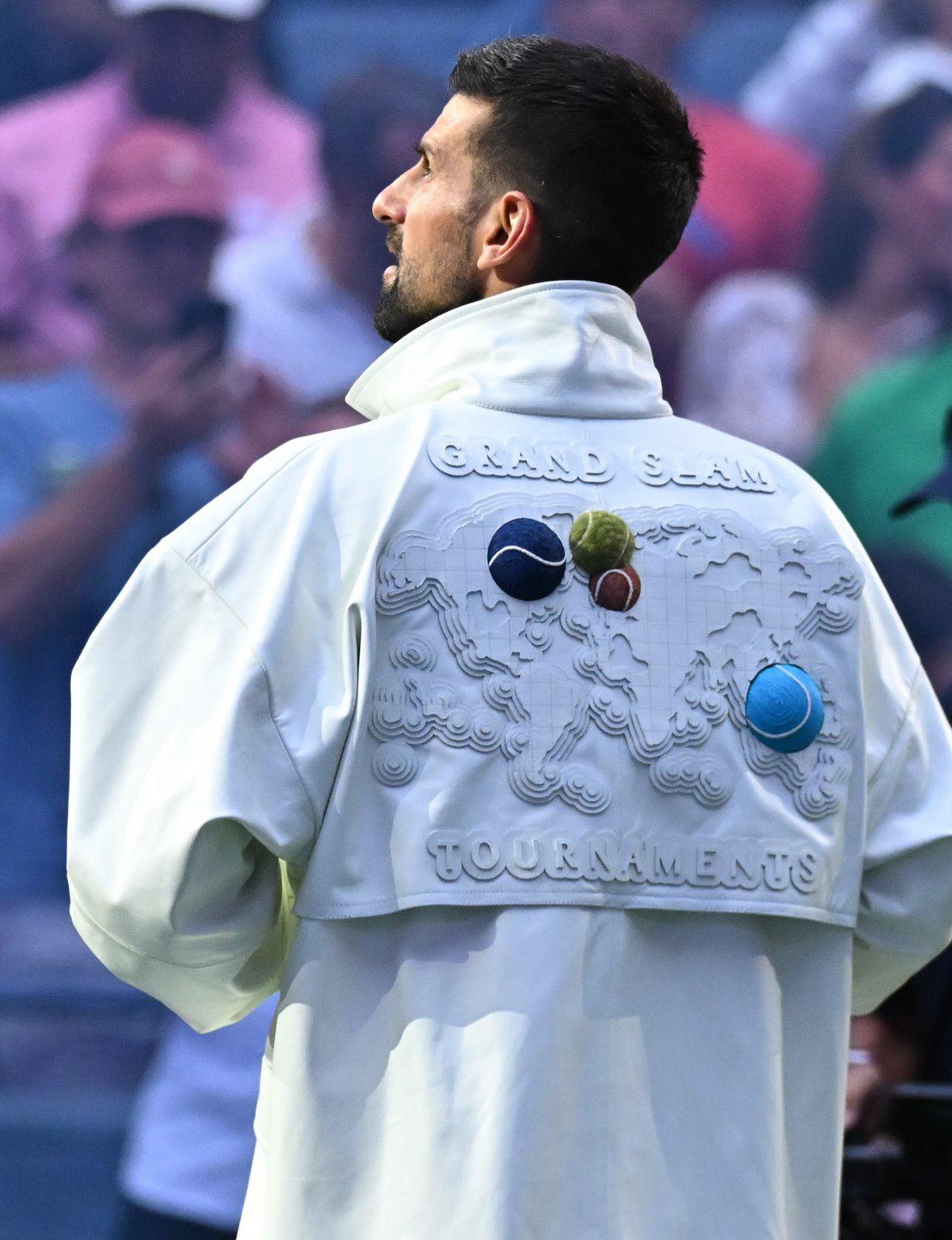 Throwback. Novak Djokovic enters the court with this custom-made 