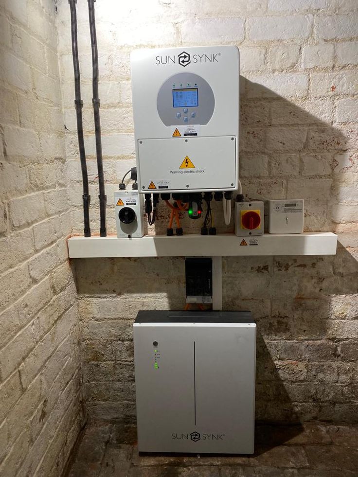 Civil - A neatly installed solar power system with a SunSync inverter ...