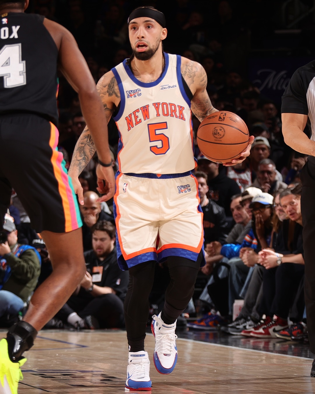 Jose Alvarado hopping in the “All-Star” Nike Air Zoom Huarache 2k4