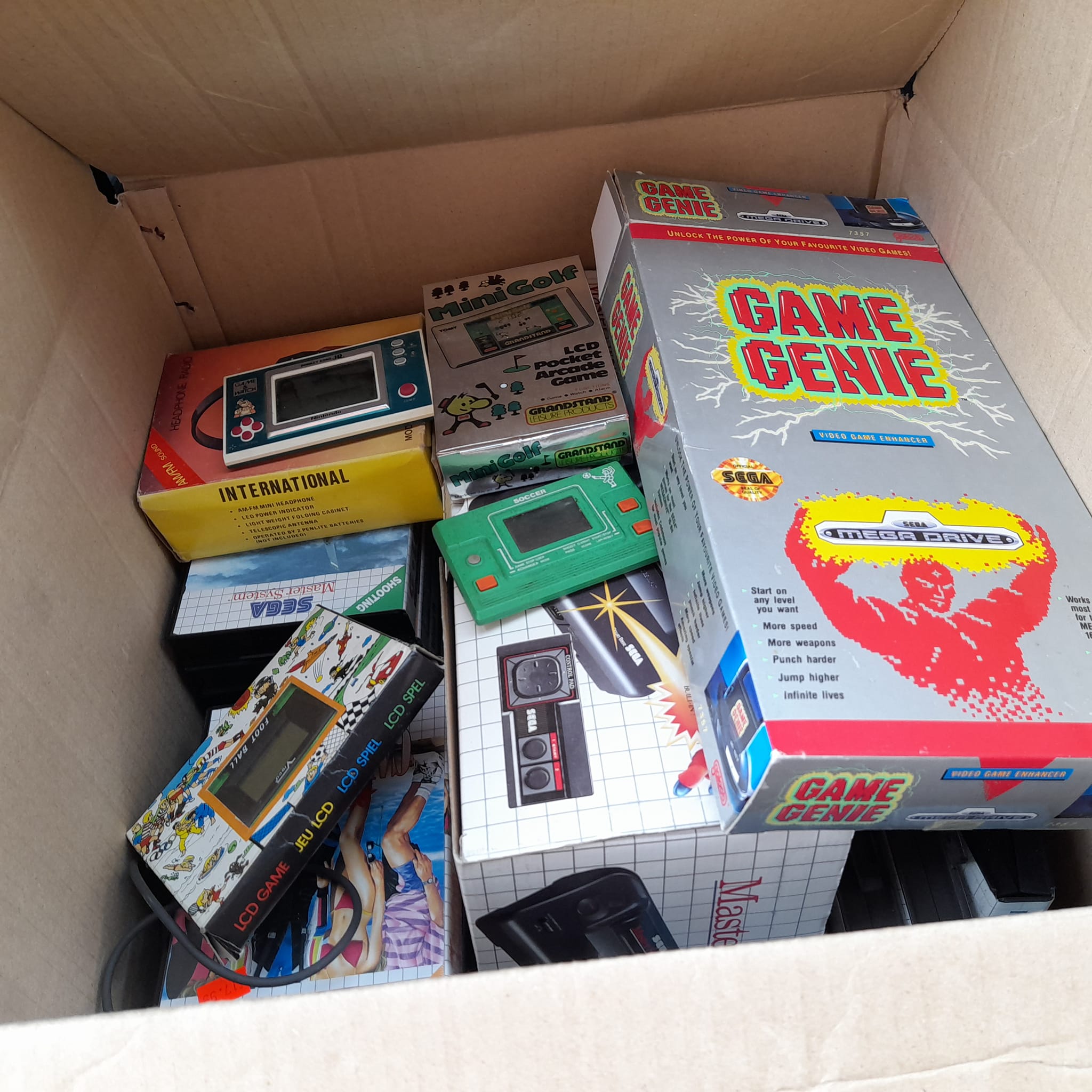 You unboxing continues. Loads of cheat books 50p, gaming magazine