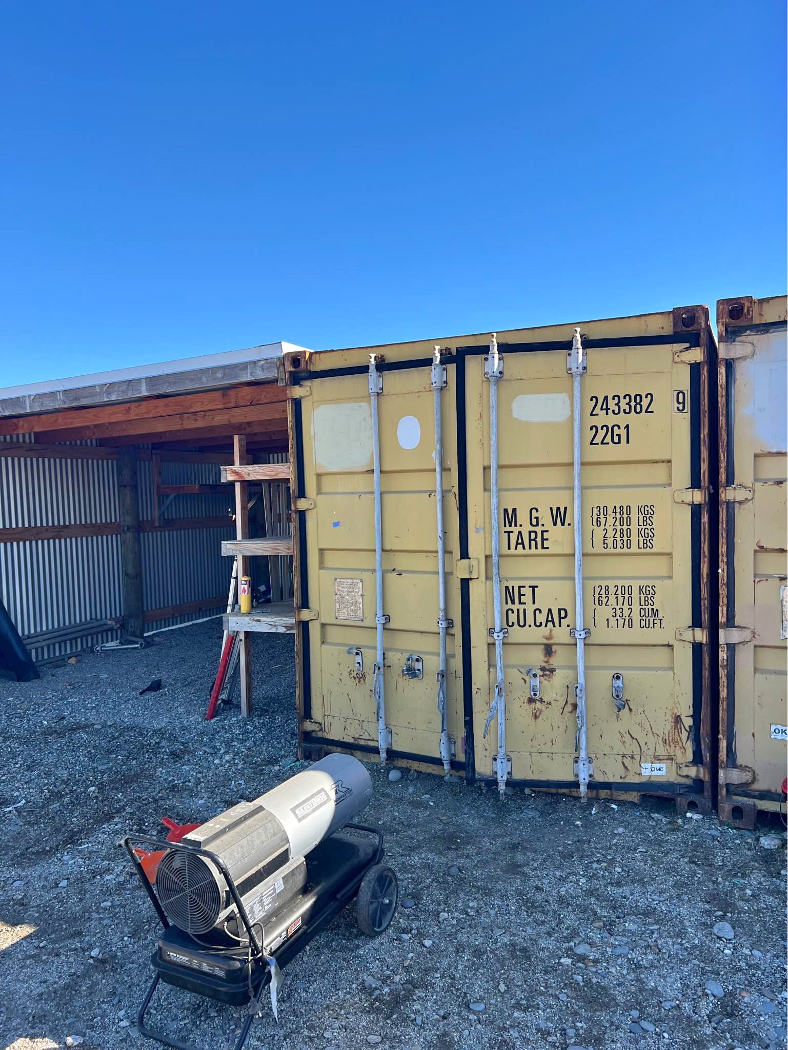 Container 20ft with lean too roof and walls 4m wide plus shelving ...
