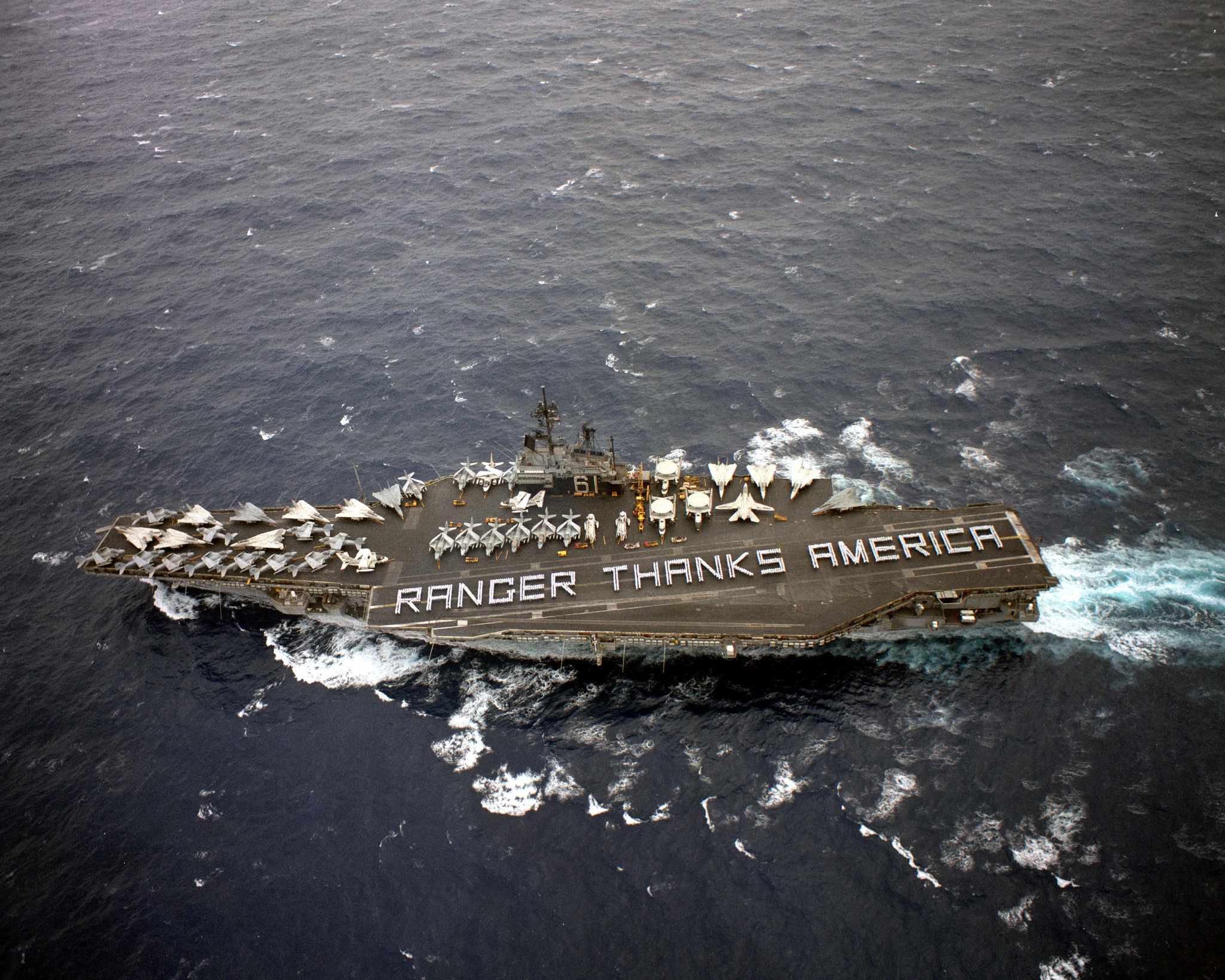 MilitaryPhotoDepot - 12/1/1988 Crew members spell out 