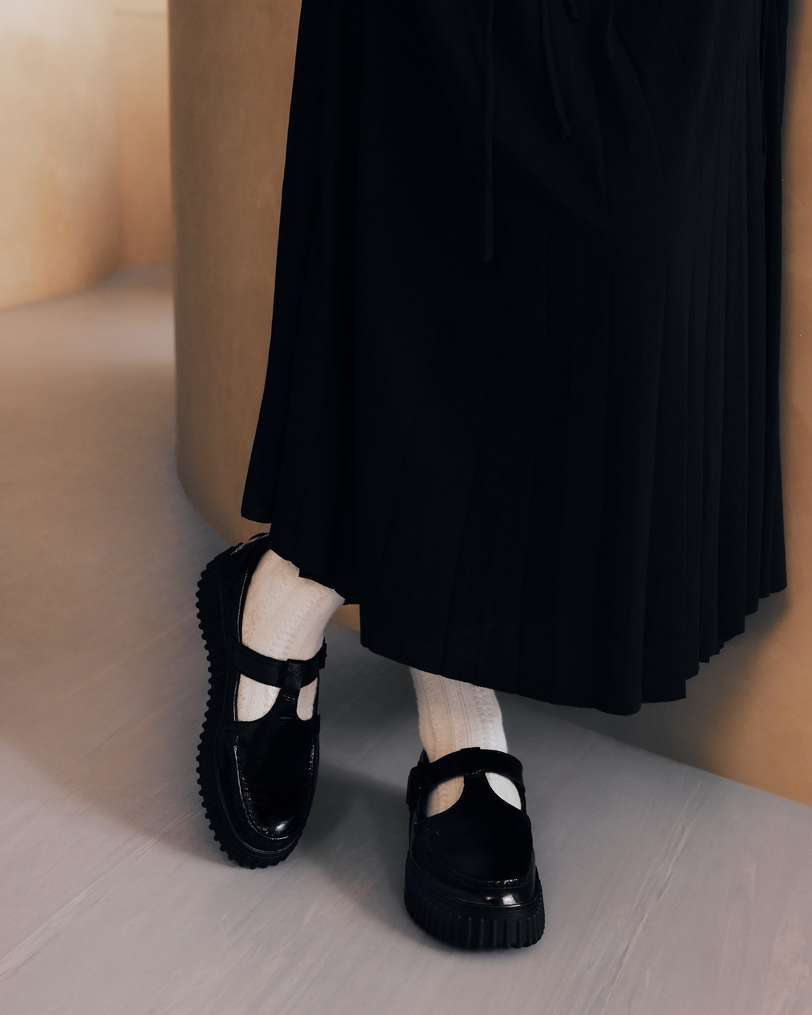 Set for iconic wardrobe status, the Torhill Bar in Black Patent 
