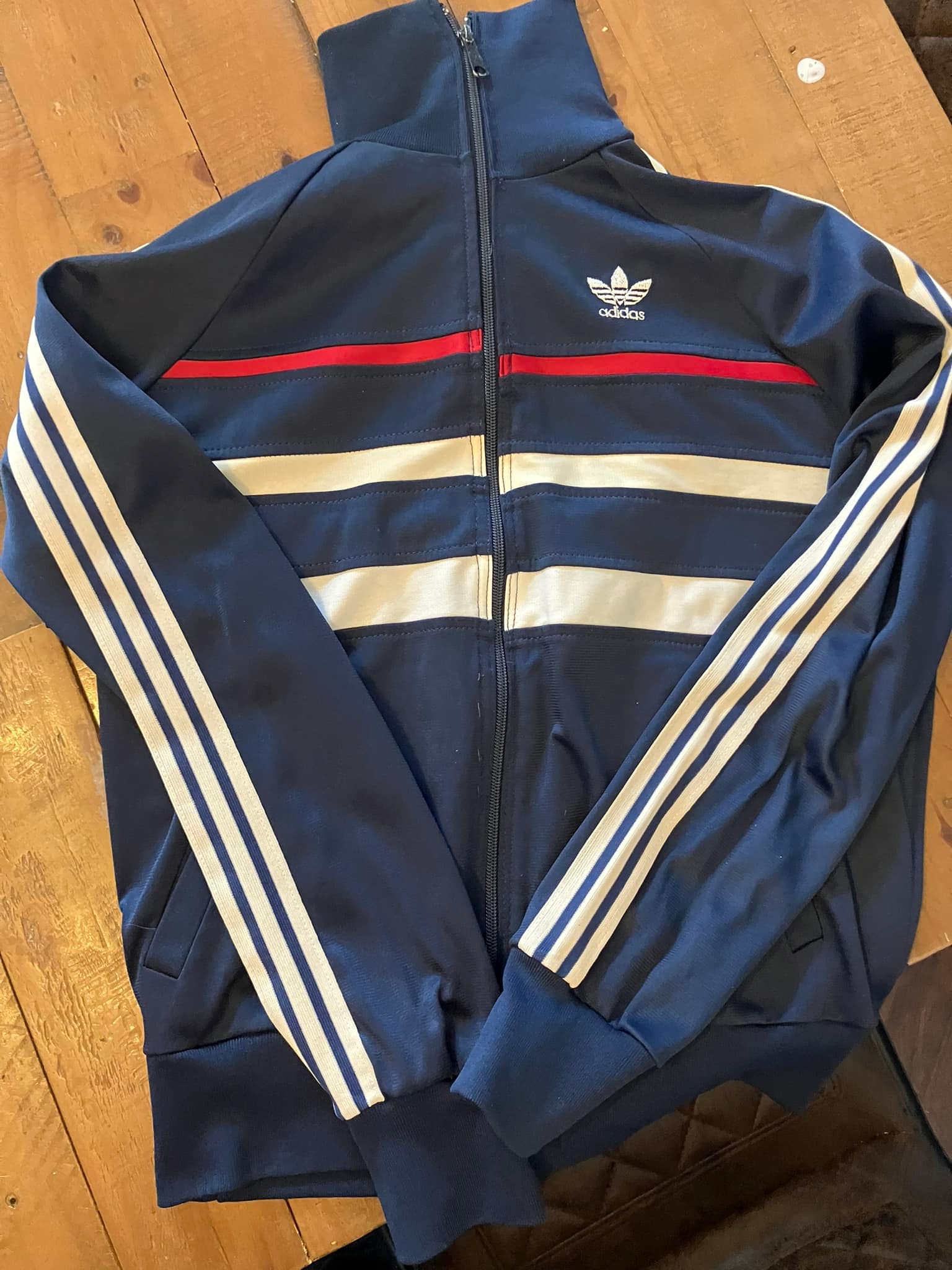 Help dating French-made Adidas top with mismatched lines