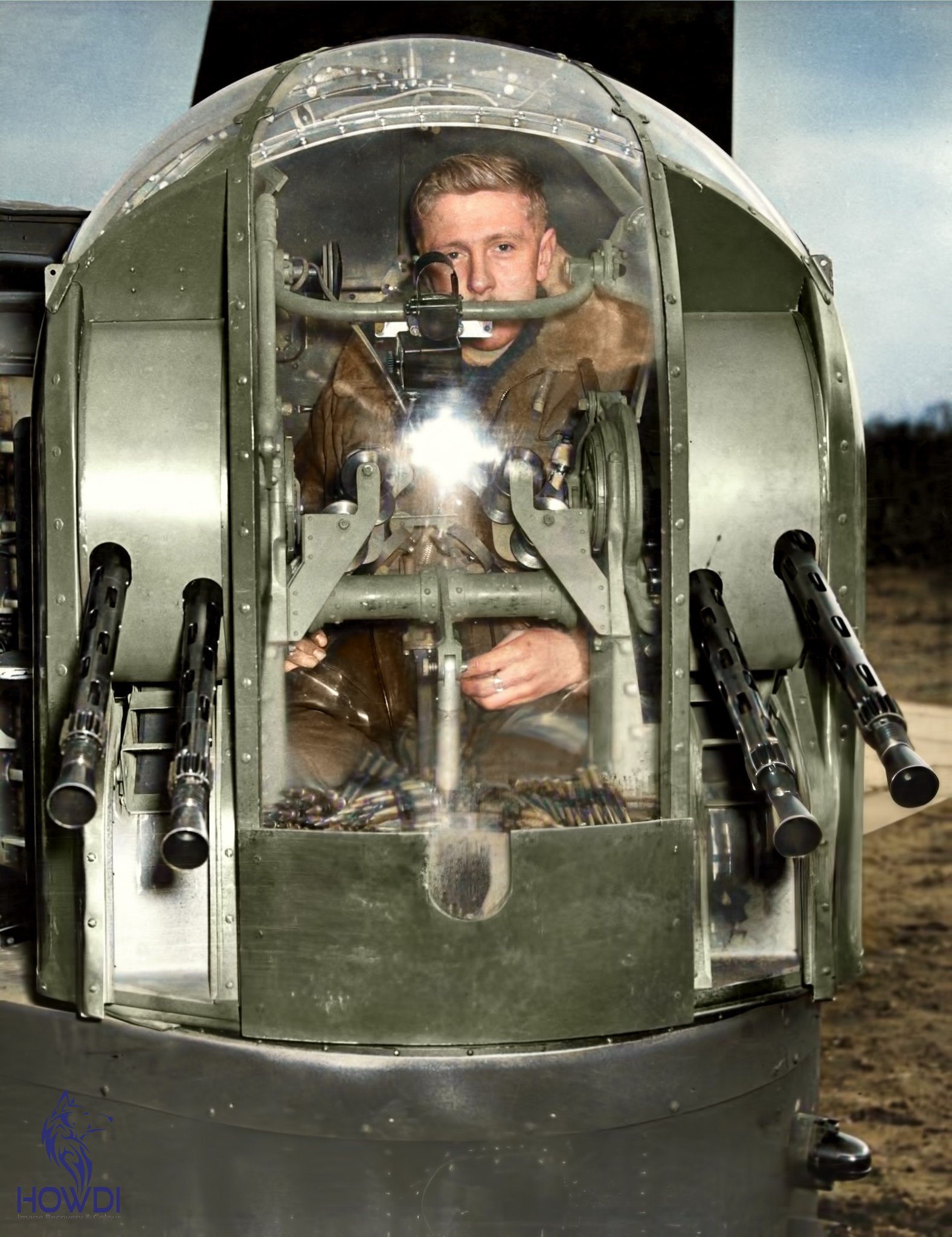 HowdiColour - A Royal Air Force air gunner sits inside the rear quad ...