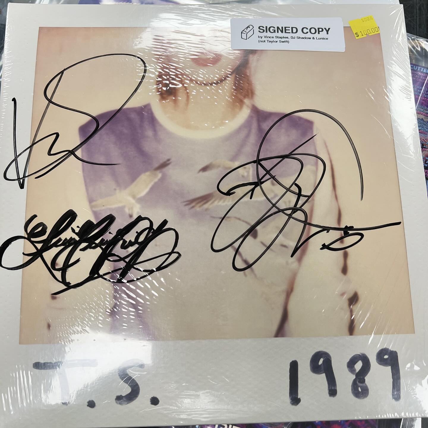 Signed Taylor Swift 1989 LP by Vince Staples, DJ Shadow, and Lunice