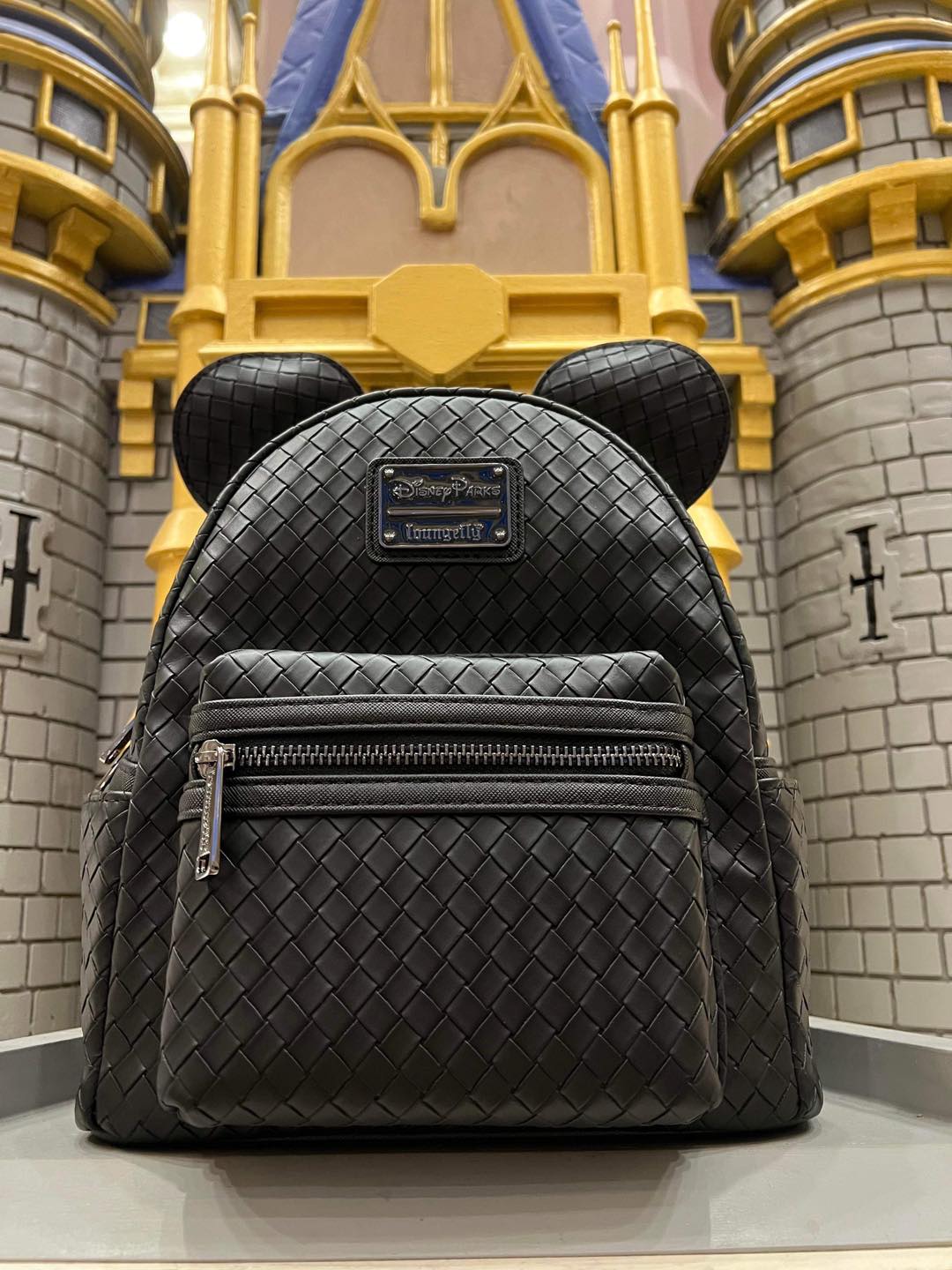 disney black mini backpack Loungefly Tinker Bell Open up the front pocket and youll discover Mickeys expression Loungefly Disney Villains Drinks Mini