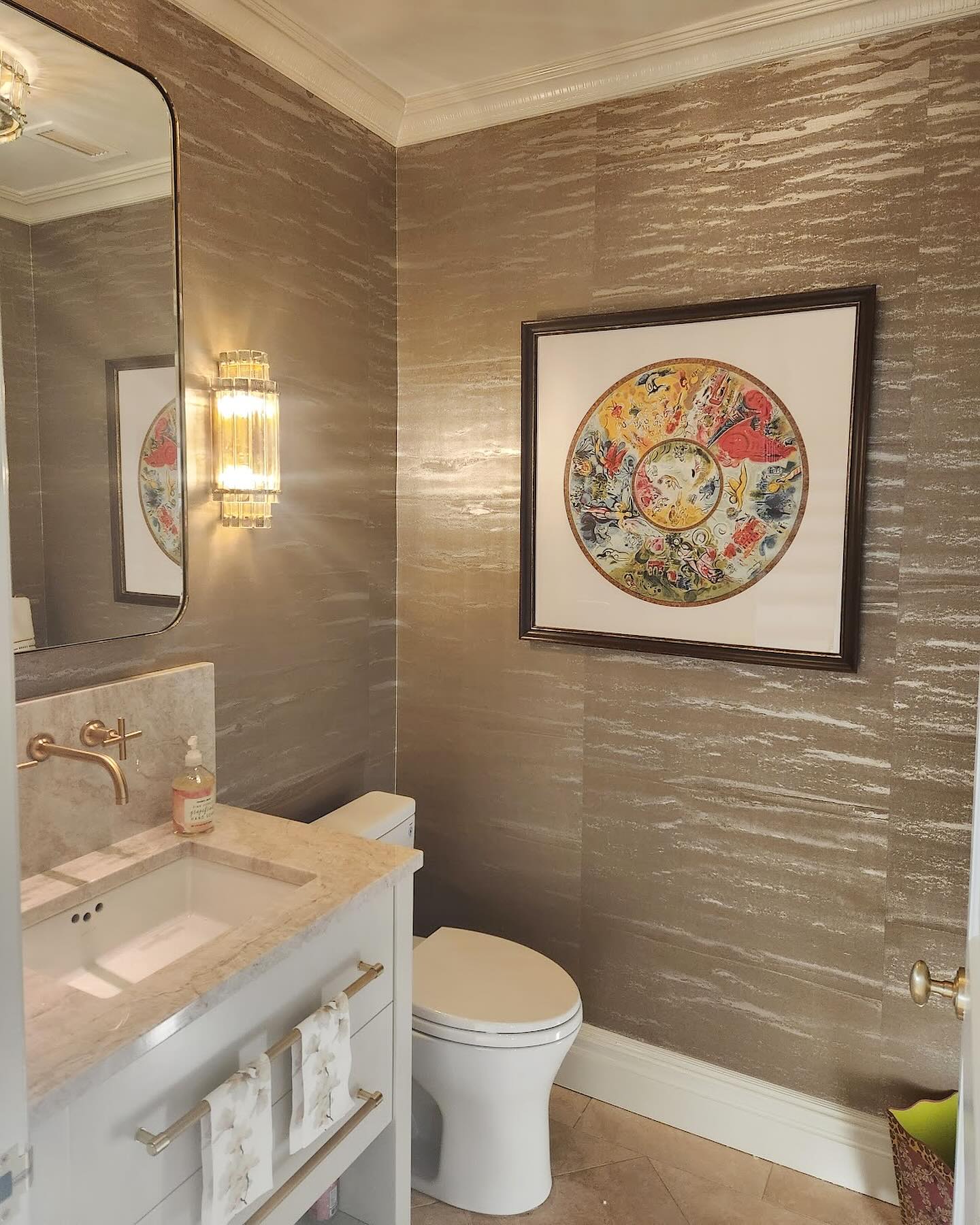 Andy - Wallpaper works wonders. This powder room has gorgeous lines ...