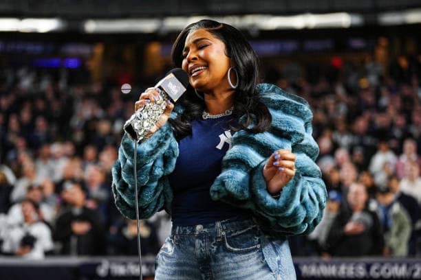 Ashanti wore a $495 @adriennelandau Shawl Collar Chinchilla Faux