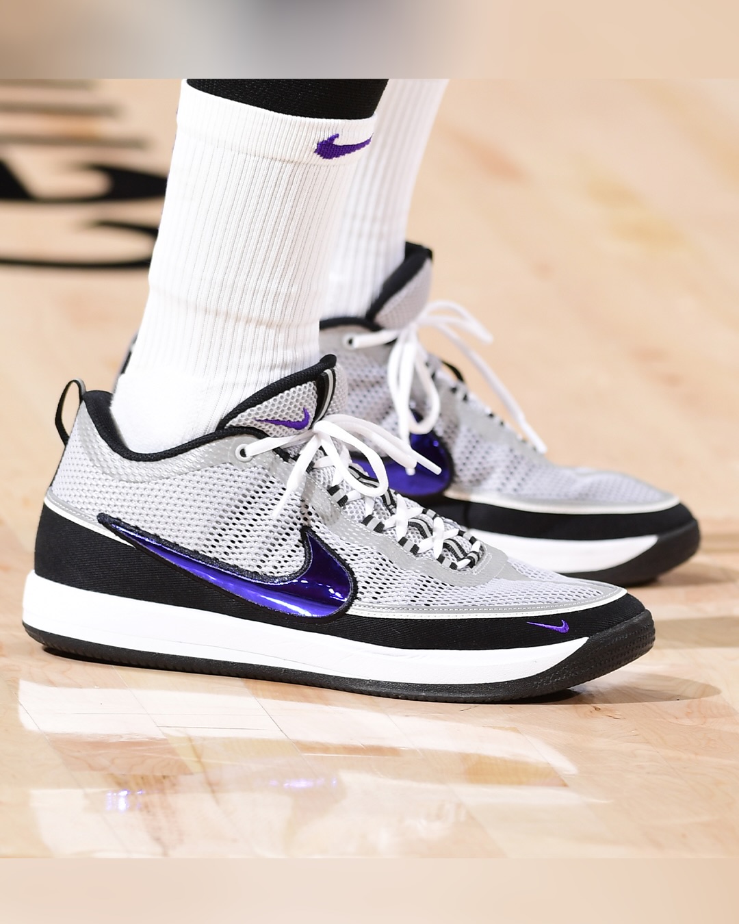 Devin Booker brought out a purple swoosh version of the “Spiridon