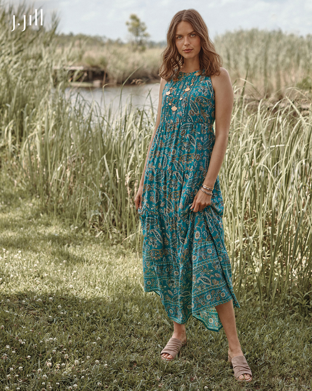 A maxi dress with a patchwork print and a classic denim jacket—this is our version of Sunday's best. Shop now: http://bit.ly/2FtriM3