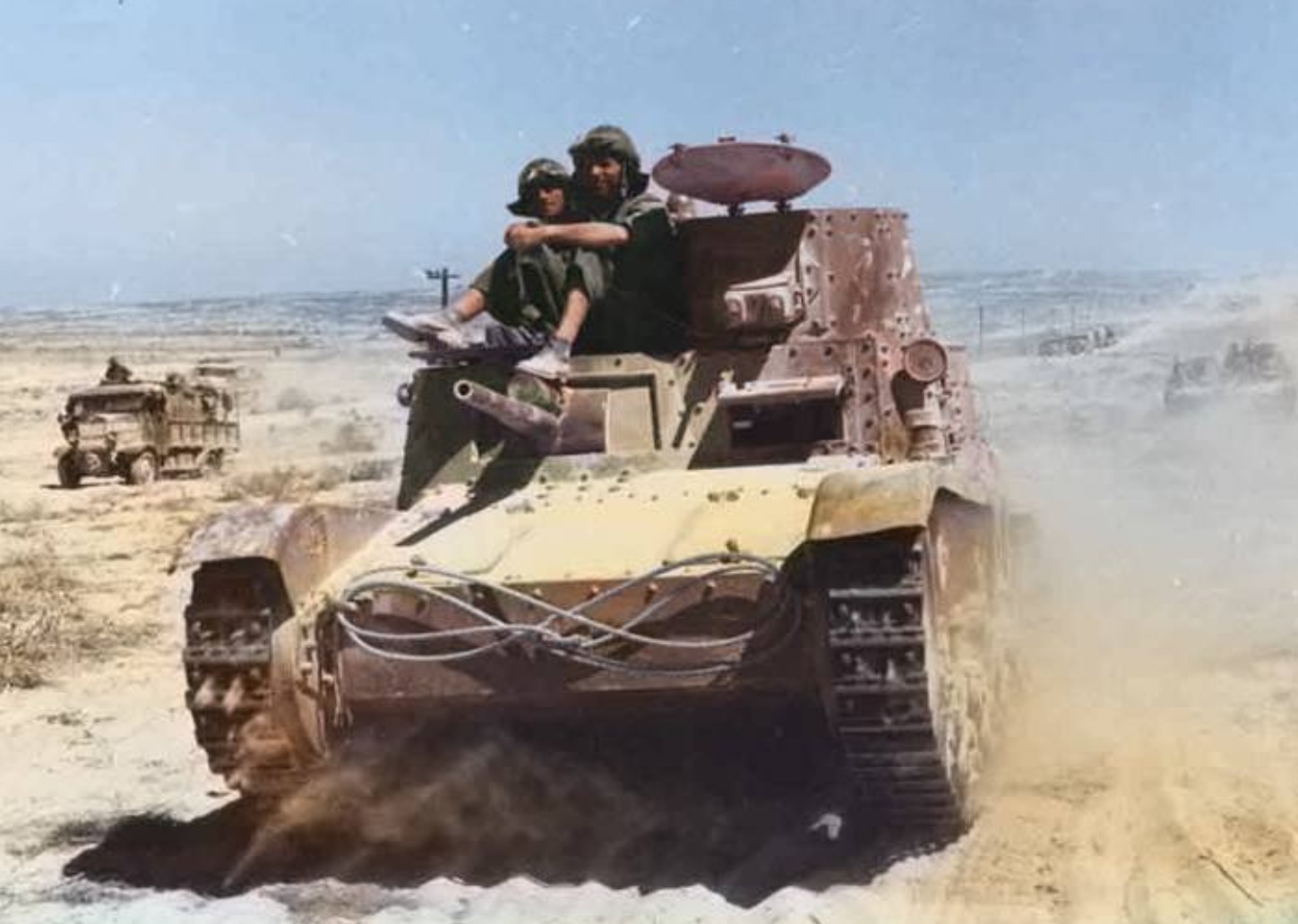 26 July 1940 A British soldier inspects an abandoned Italian Fiat 