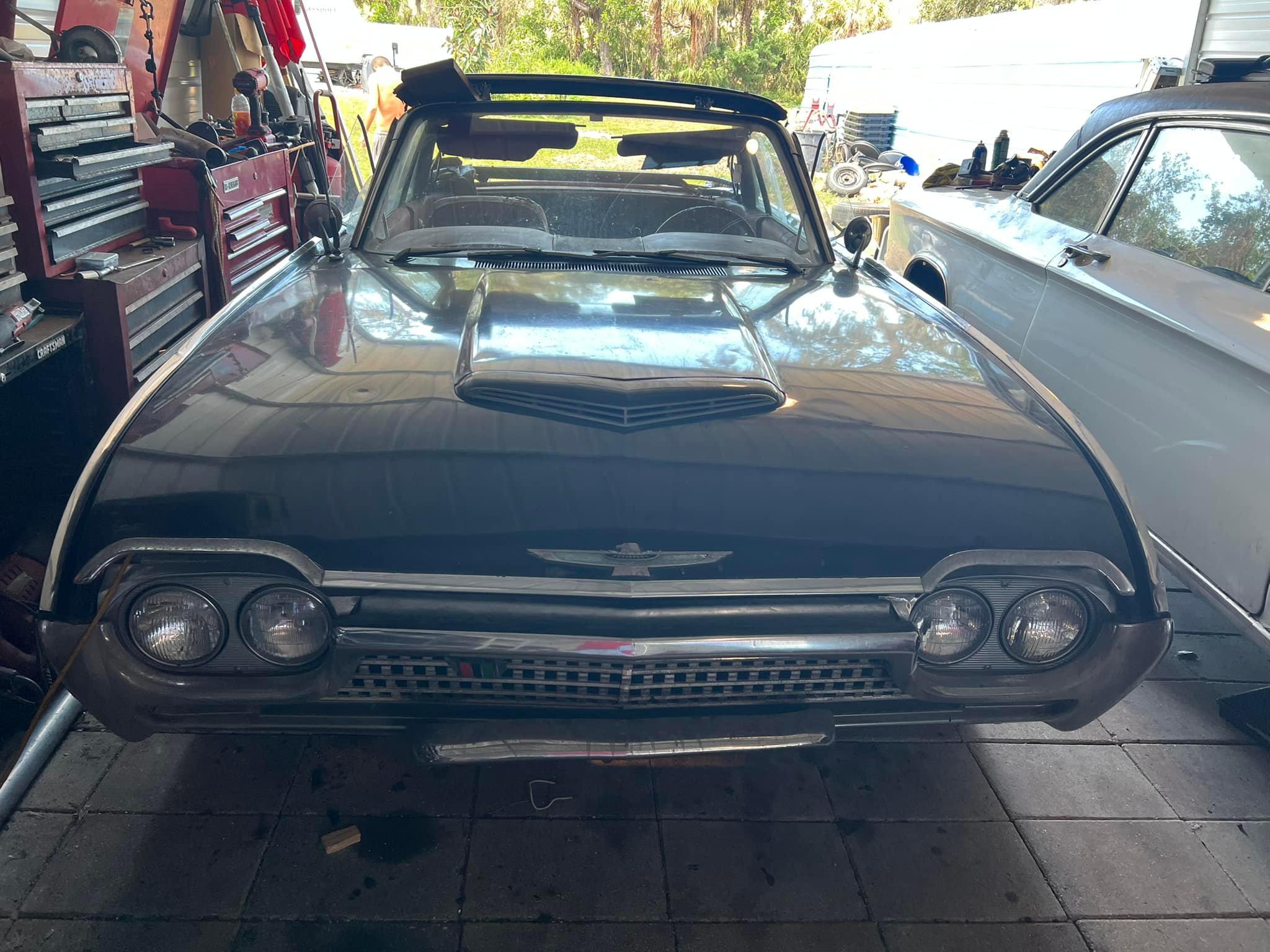 What is the part of the convertible top that joins the windshield and how to replace it