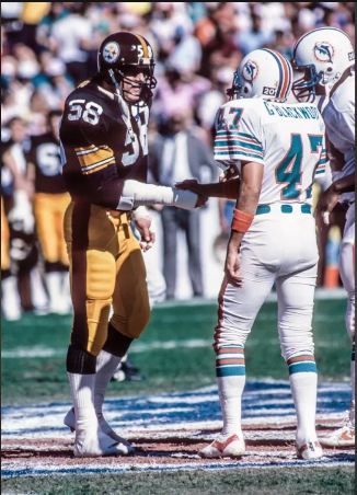 January 6, 1985: Steelers linebacker Jack Lambert shakes hands