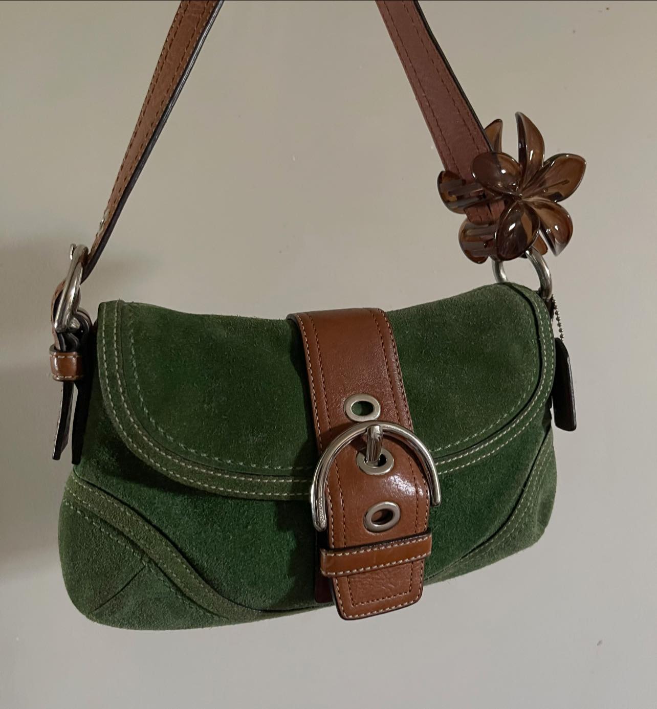 Trading green suede Soho for pink, red, or chocolate brown Coach bag