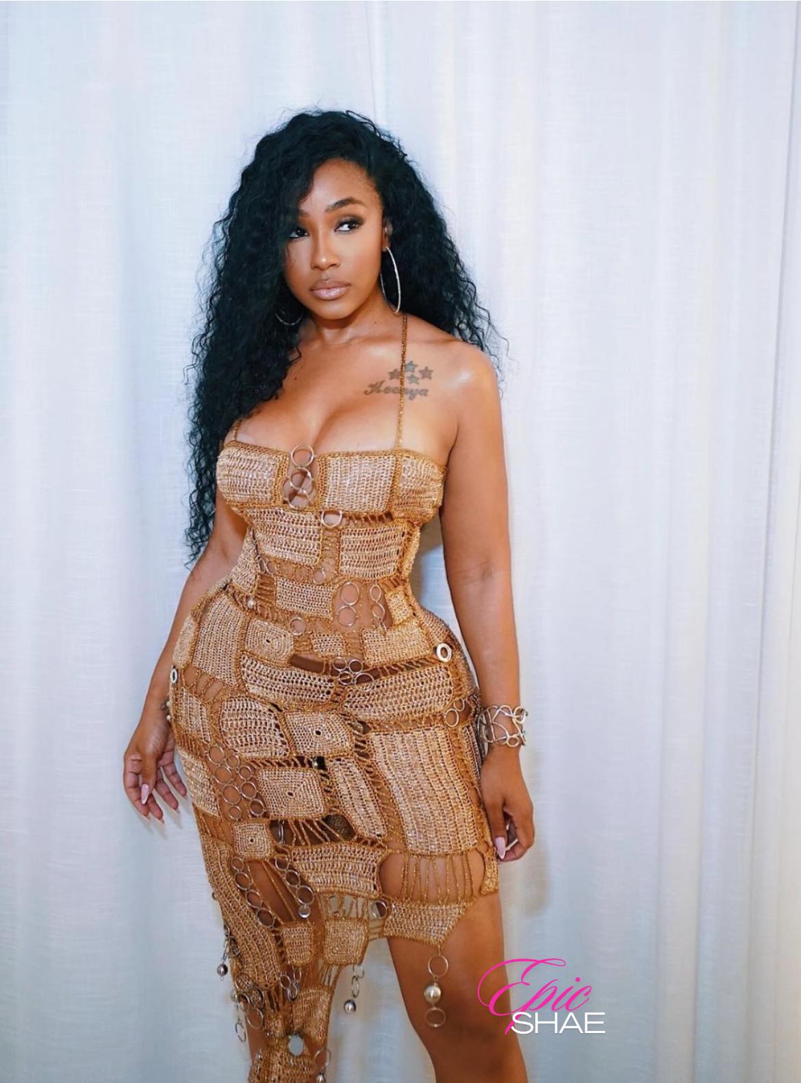yung miami gold dress revealed in a since-deleted post, earlier this week, that she's already brought in $1 million from her Caresha Please brand Fashion nova
