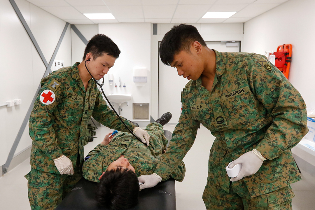 The Singapore - Corporal (CPL) Afiq Zulfadhli Bin Azhar (right), from ...
