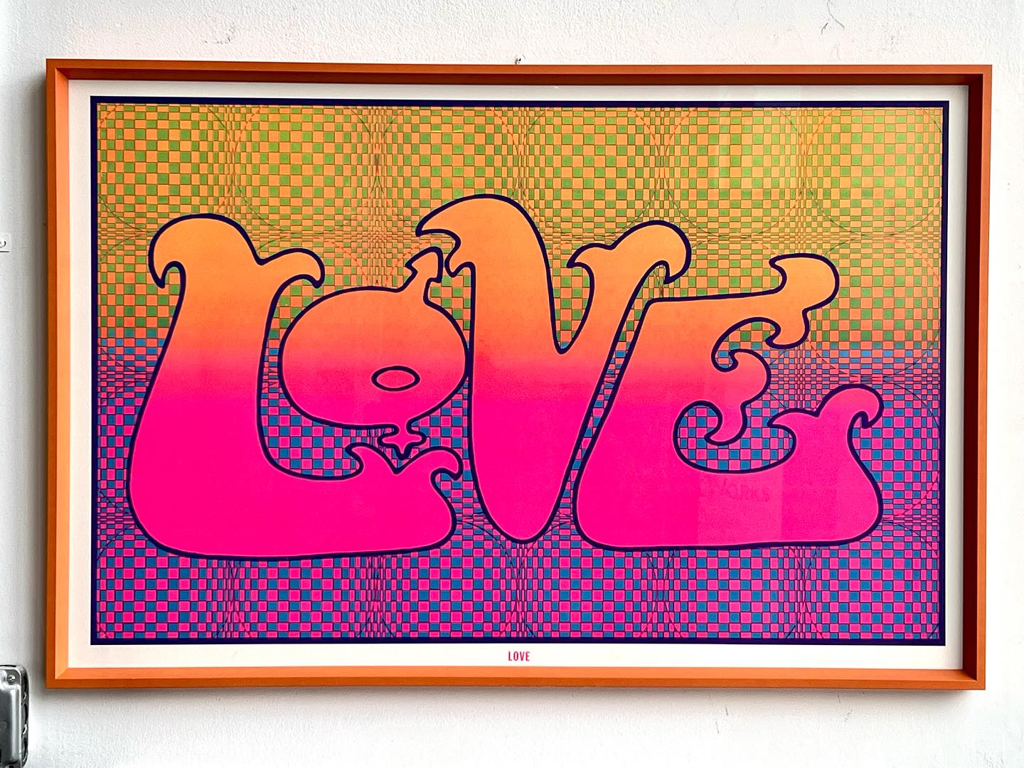 Original vintage blacklight poster for the band “Love” featuring