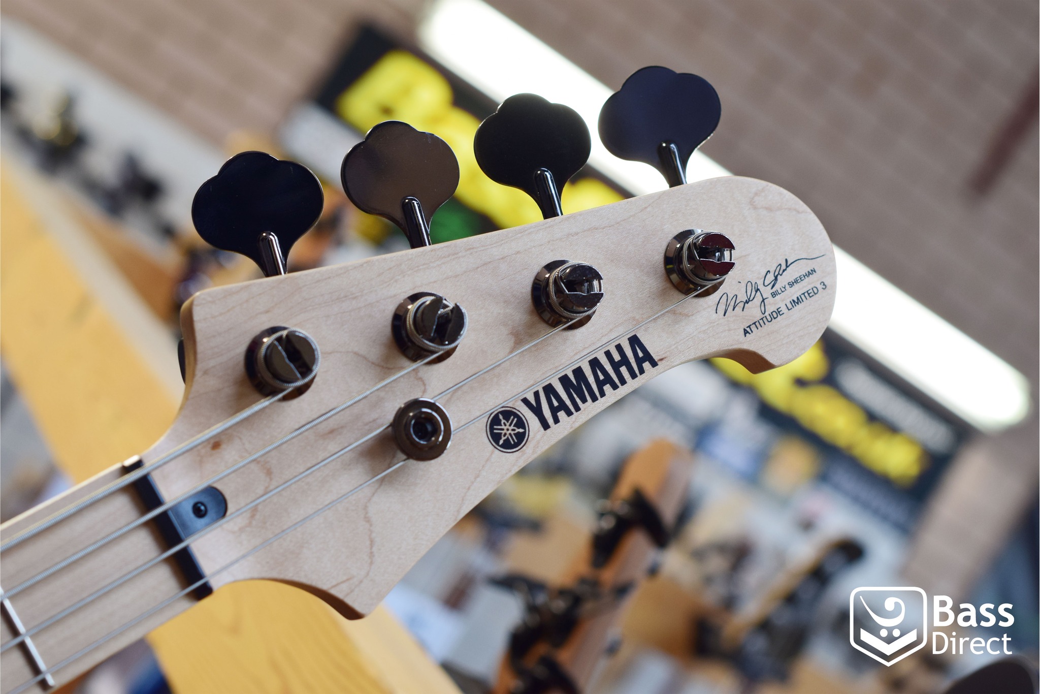 Yamaha Attitude basses customized with Monkey Grip and swirl paint