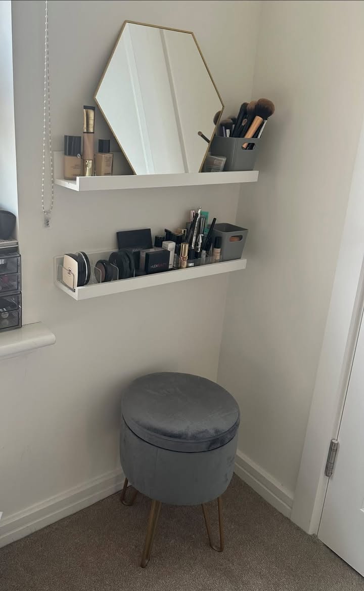 Black fiberboard IKEA MOSSLANDA picture ledge. This wall-mounted shelf has a grooved design to keep frames at the correct angle. It is finished in a black foil. Estimated (WxDxH): 45 x 5