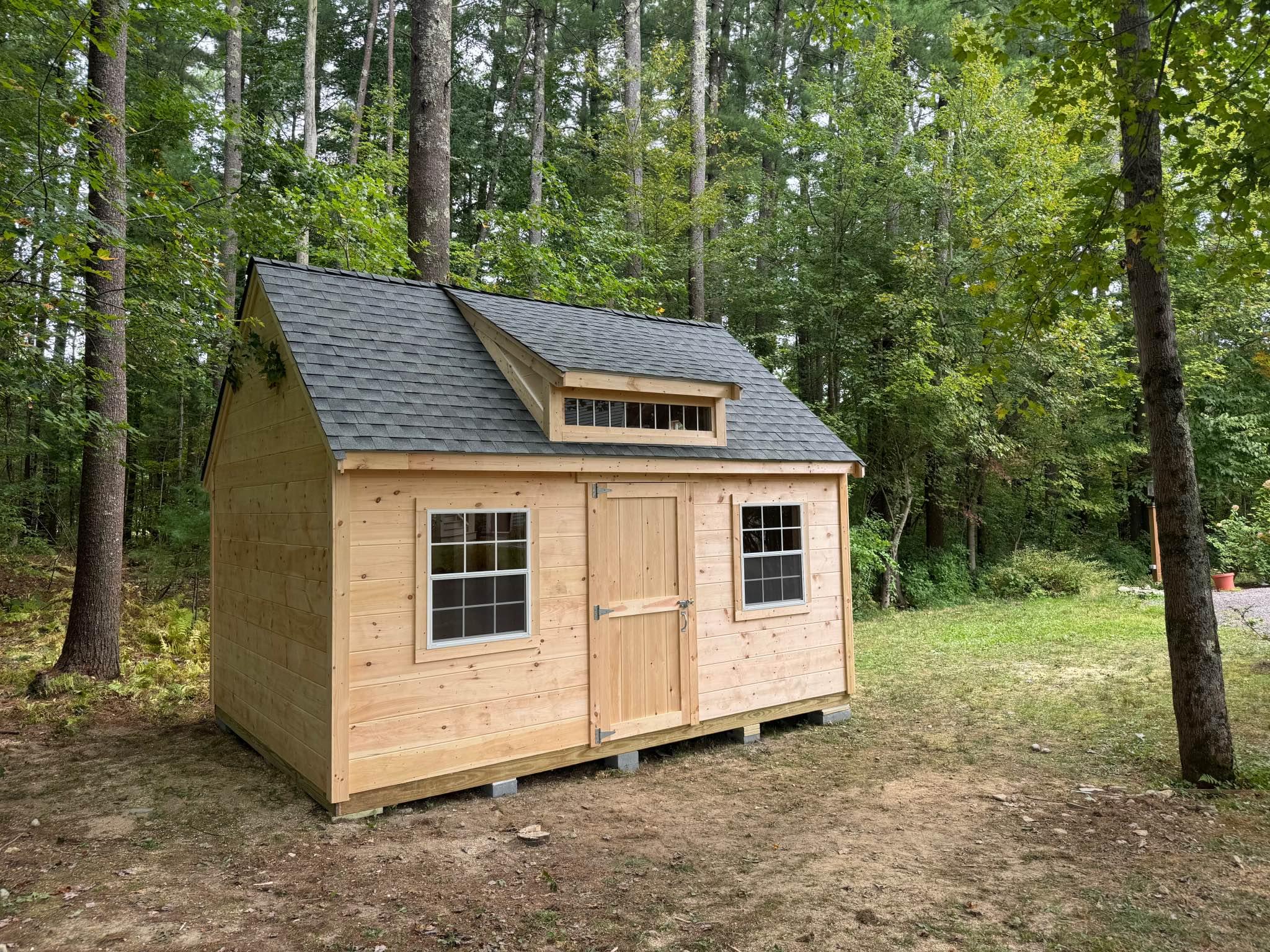 12x16 (12 pitch) pine, 7 ft sidewalls, double and single door, ramp , 2