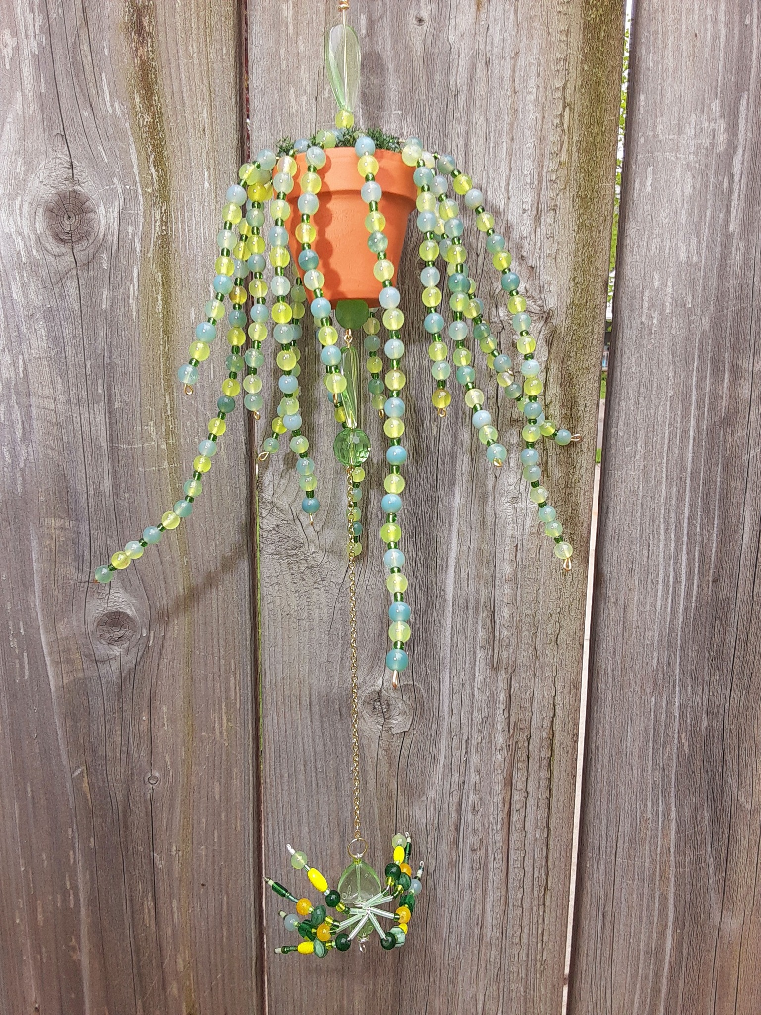 Suncatcher with green chalcedony and glass beads