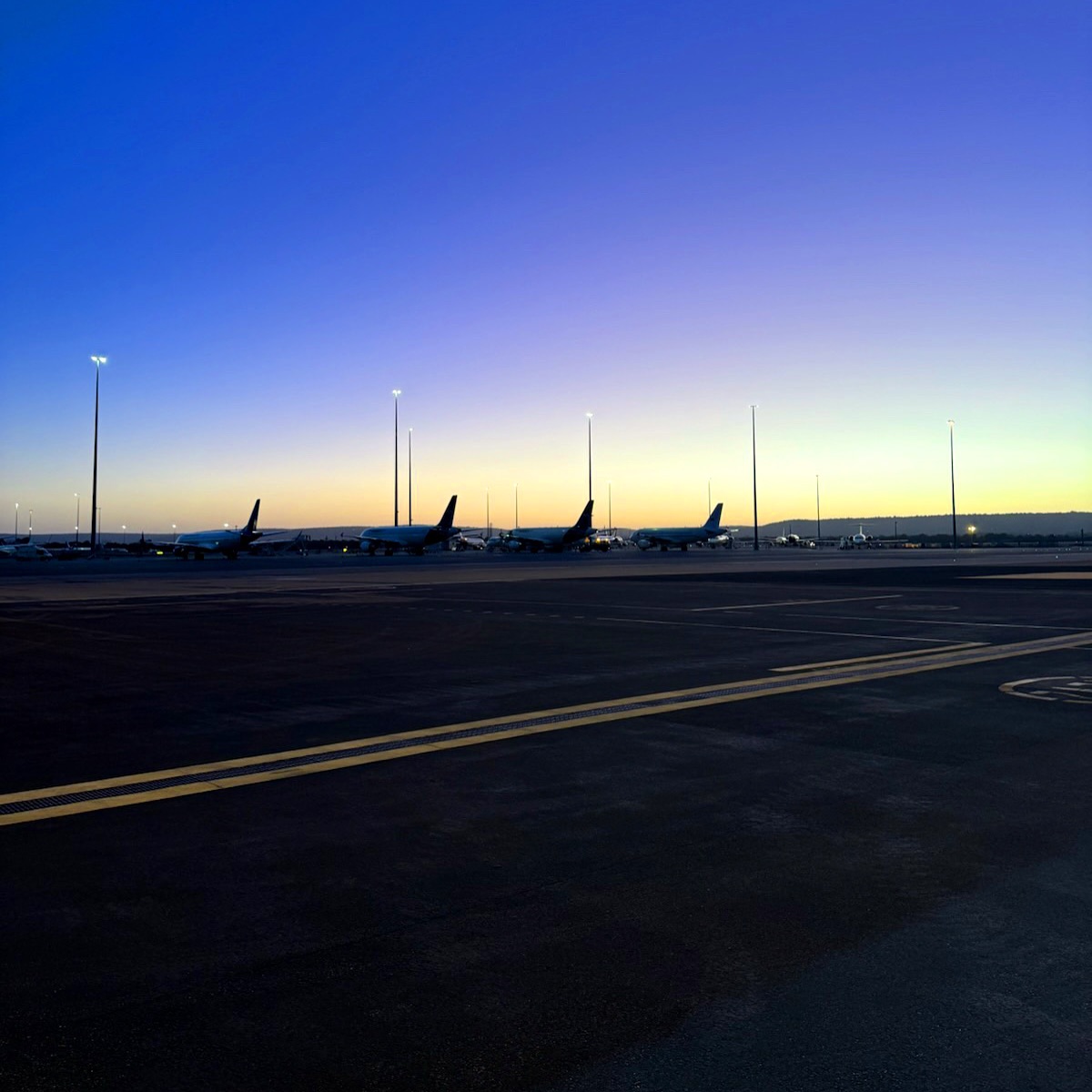 Revesco - FBO: The gentle light of sunrise silhouettes the jets as we ...
