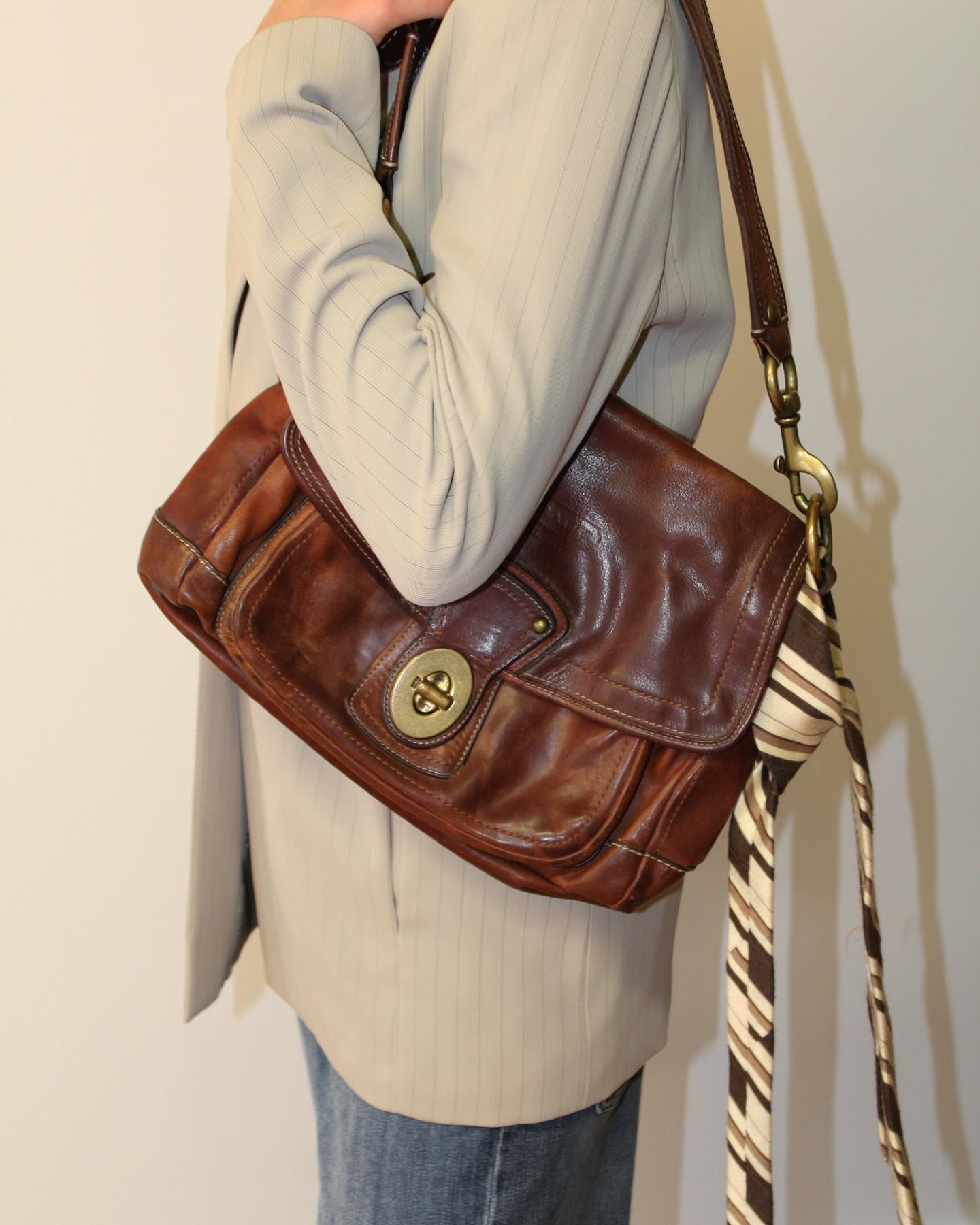 Coach Legacy Vintage Ali Whiskey Leather Flap Bag from our SS25 