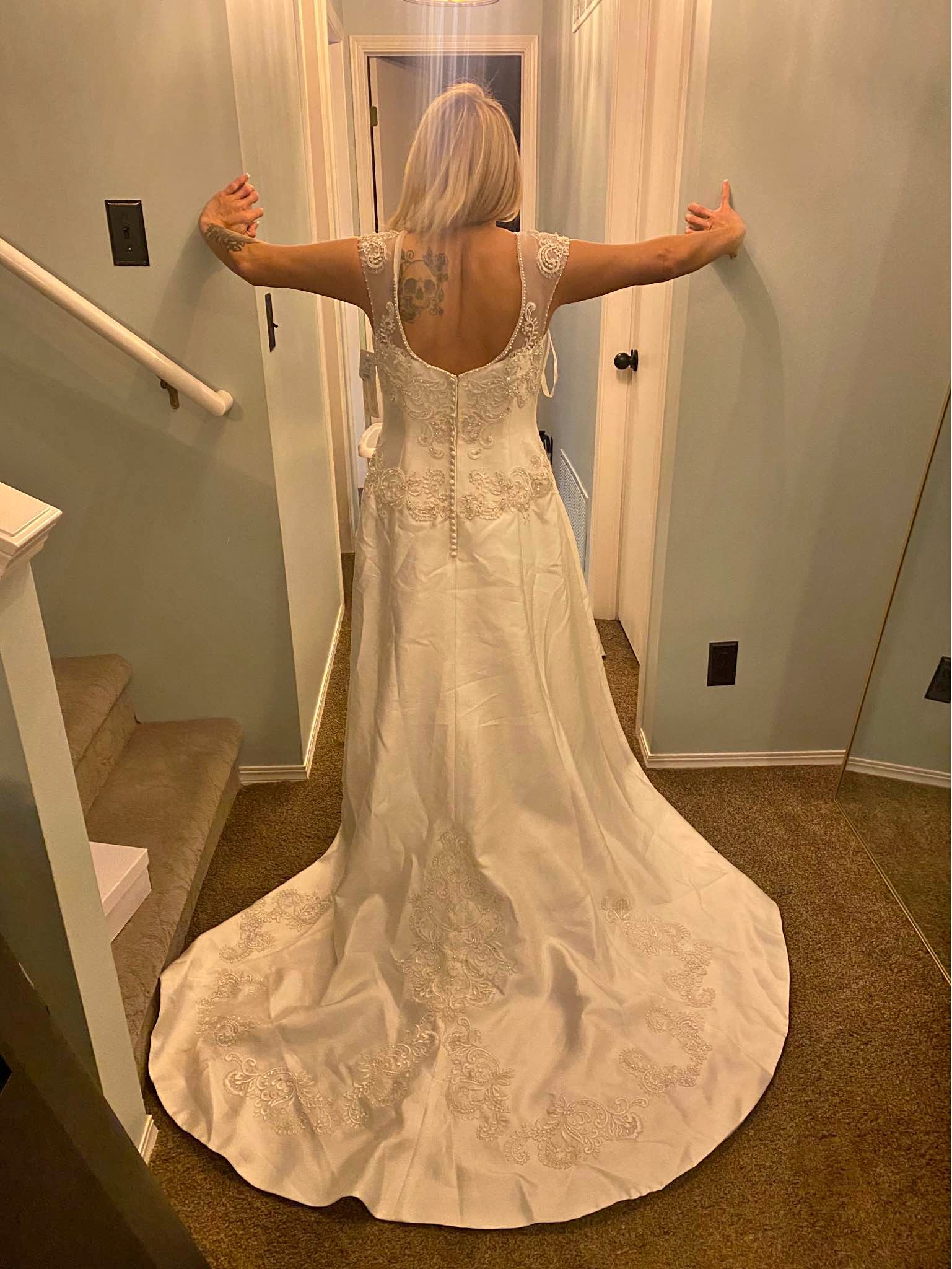 New wedding dress and shoes with from David’s Bridal. Paid $2700 asking