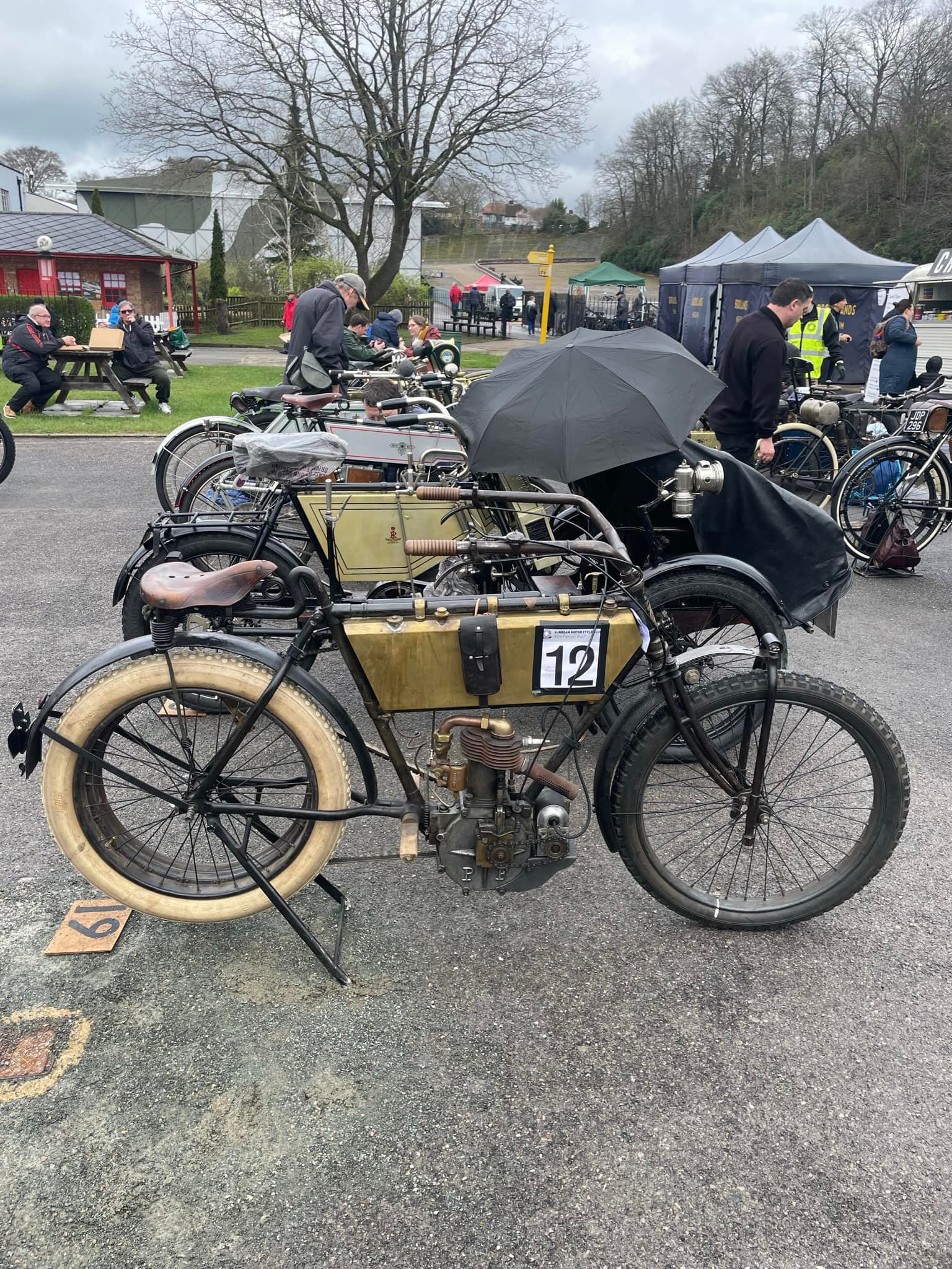 A 1904 Peugeot motorcycle at the Sunbeam 100 at the Brooklands