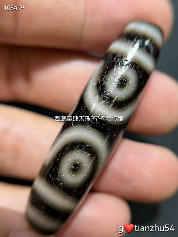 西藏天珠十字六眼天珠满满朱砂，非常大气的十字六眼天珠尺寸54*14mm 六
