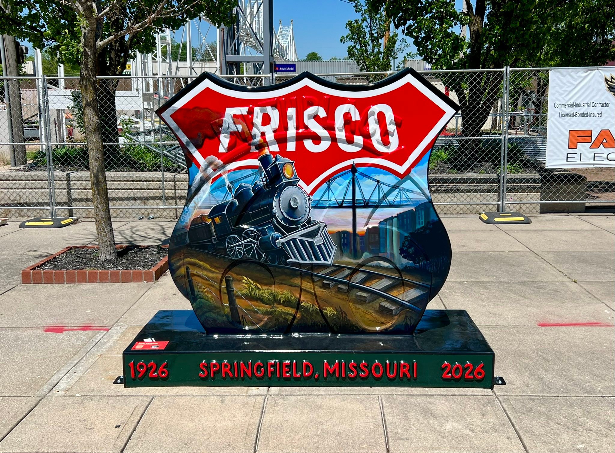 Artist creating mosaic mural from donated mugs for Route 66